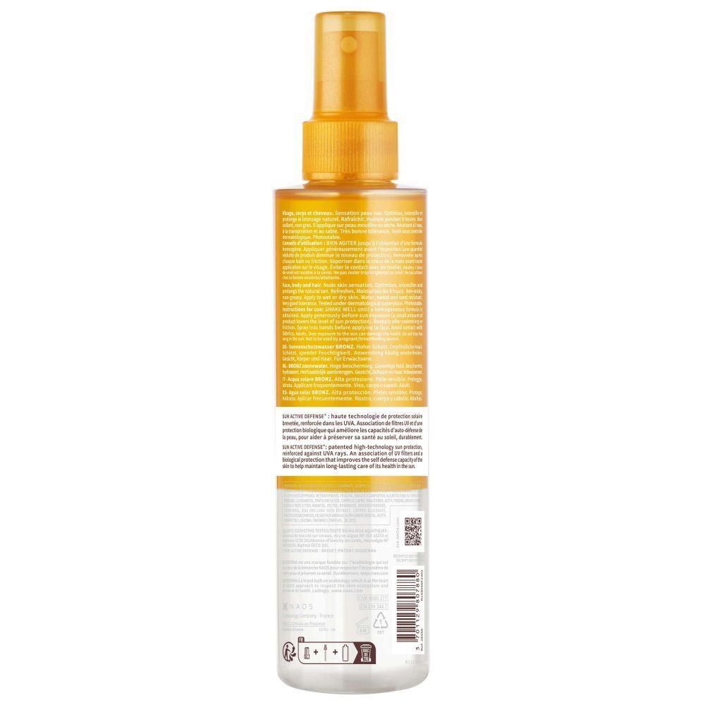 Dos du flacon BIODERMA Photoderm Eau solaire Bronz SPF30. Texte, ingrédients, code QR, symboles de recyclage.