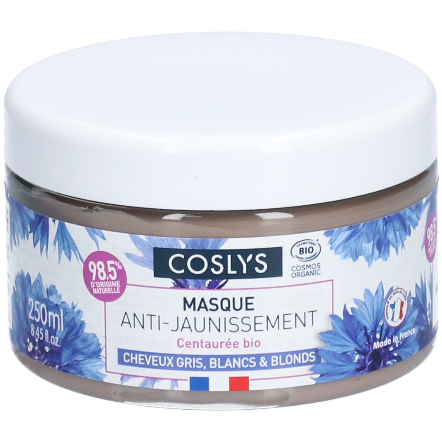 Pot rond avec couvercle blanc. Inscription: Coslys Masque Anti-Jaunissement. Motifs floraux bleus. 250ml.