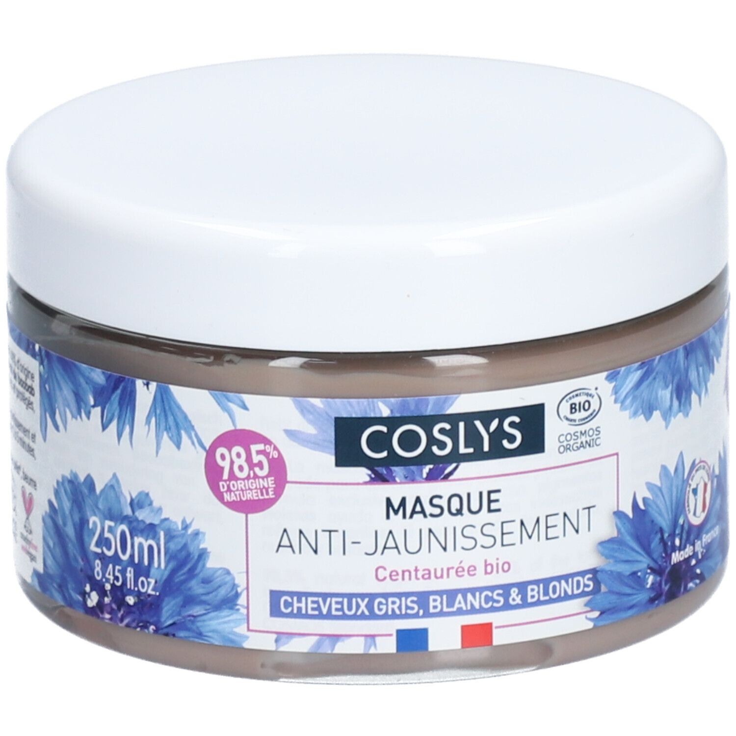 Pot rond avec couvercle blanc. Inscription: Coslys Masque Anti-Jaunissement. Motifs floraux bleus. 250ml.