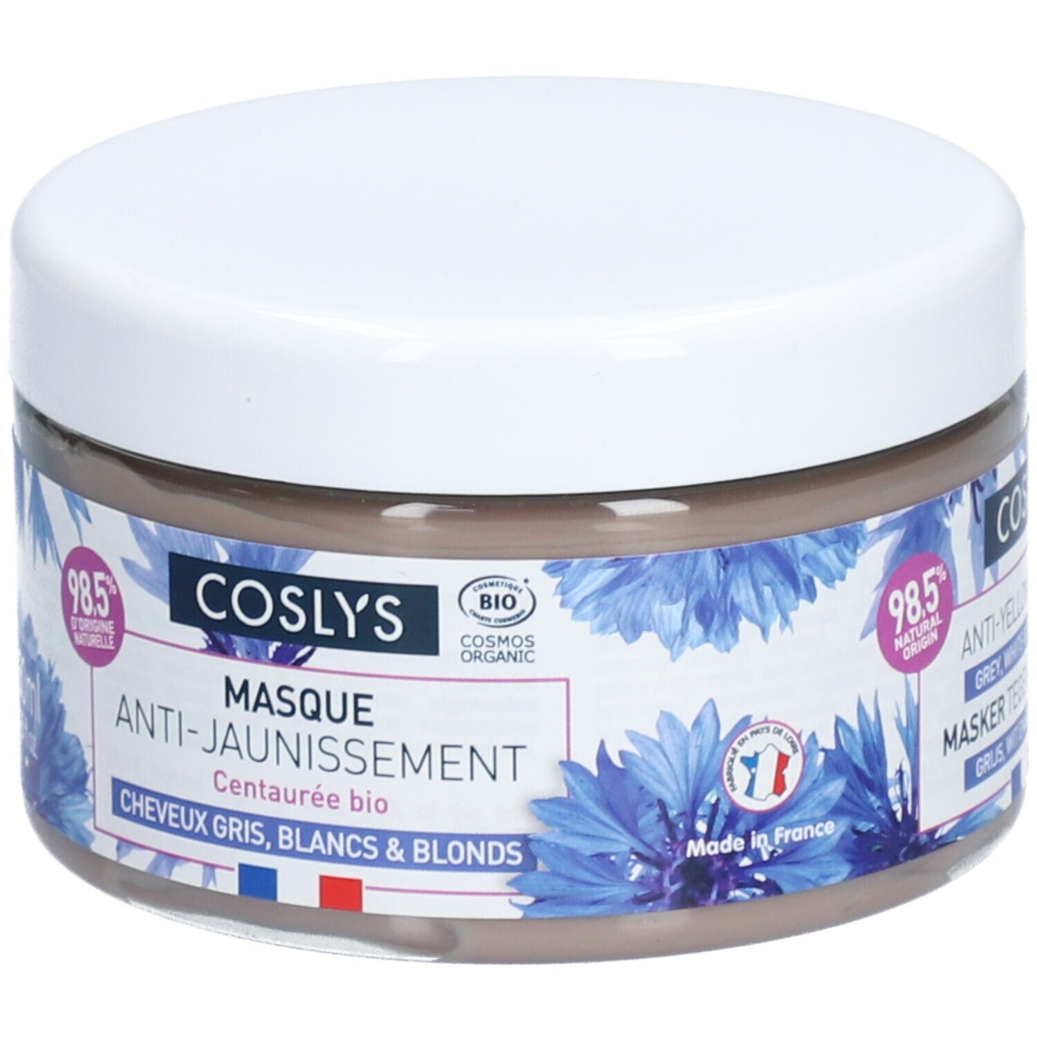 Pot rond avec couvercle blanc. Inscription: Coslys Masque Anti-Jaunissement. Motifs floraux bleus. 250ml. Fabriqué en France.