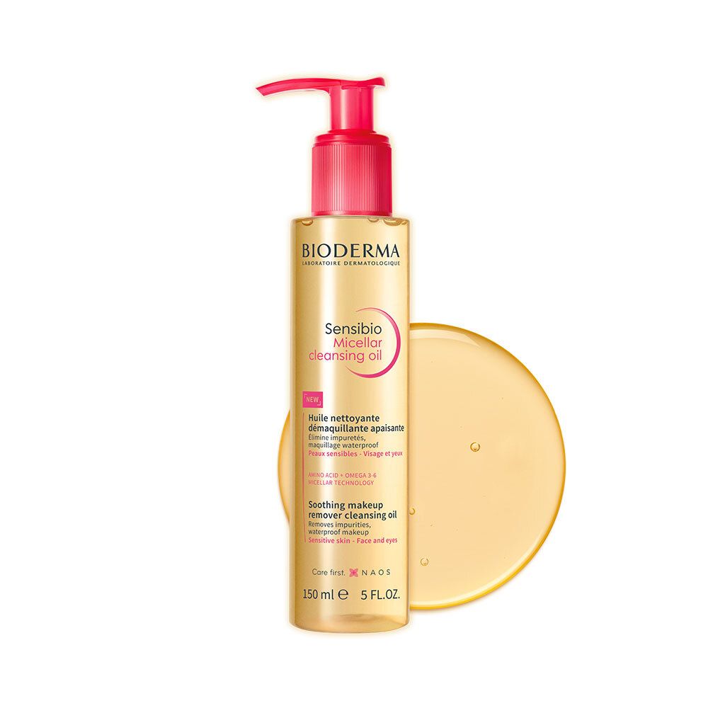 BIODERMA Sensibio reinigingsolie. Fles en product op lichte achtergrond. Roze pomp.