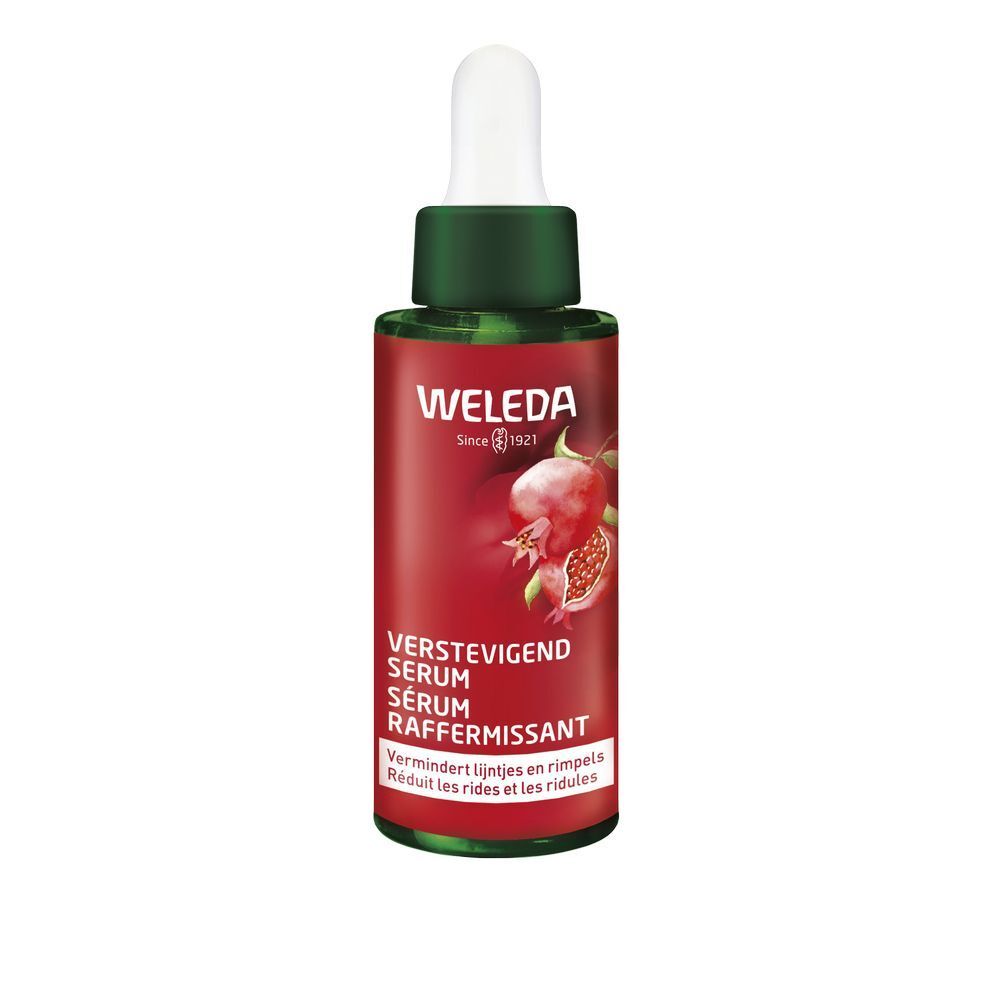 Rote Glasflasche mit Pipette. Aufschrift: WELEDA, VERSTEVIGEND SERUM, SERUM RAFFERMISSANT. Granatapfel-Illustration.