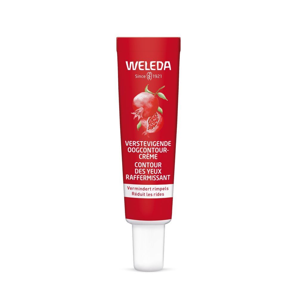Tube rouge avec bouchon blanc. Texte: Weleda, produit grenade, crème yeux. Réduit les rides.