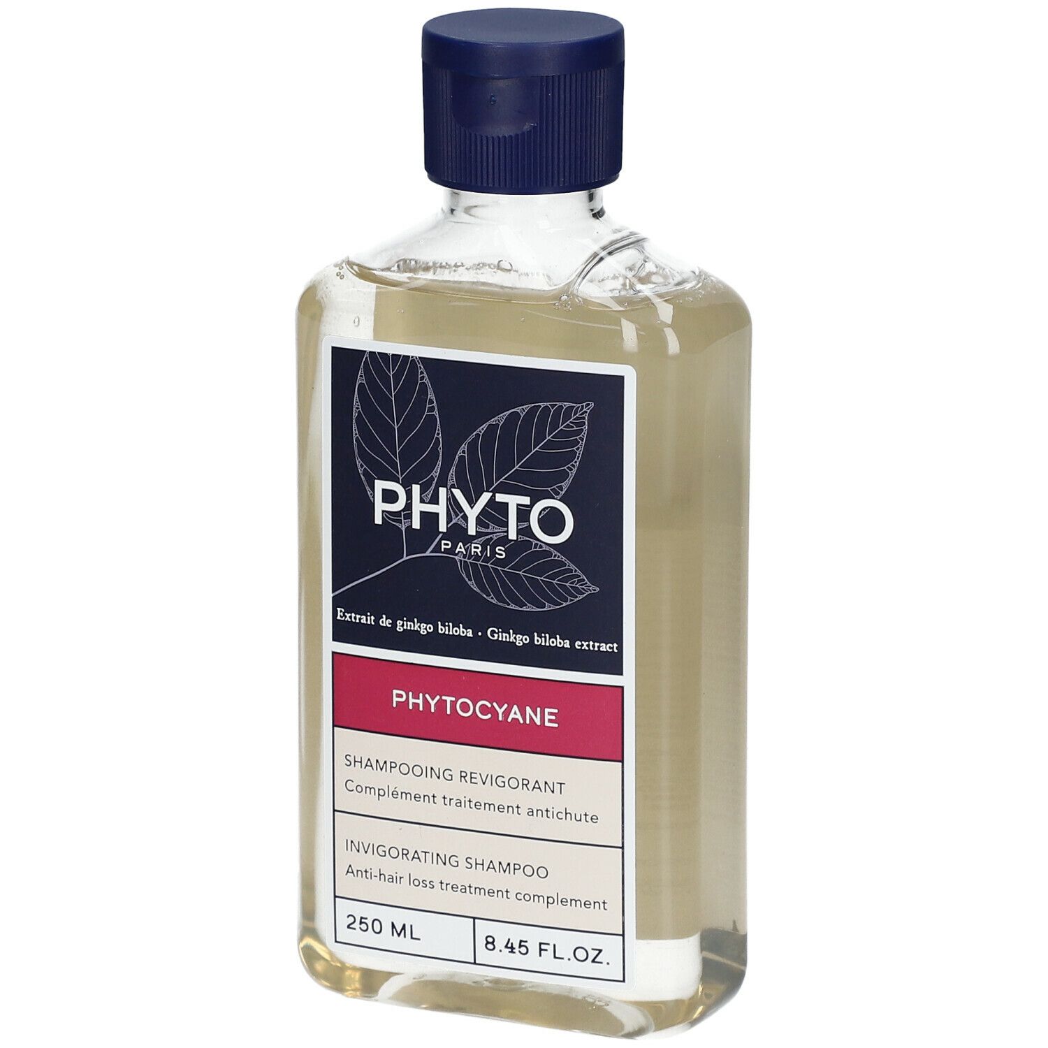 Flacon transparent, bouchon bleu. Étiquette "PHYTO PARIS", "PHYTOCYANE". 250 ml.