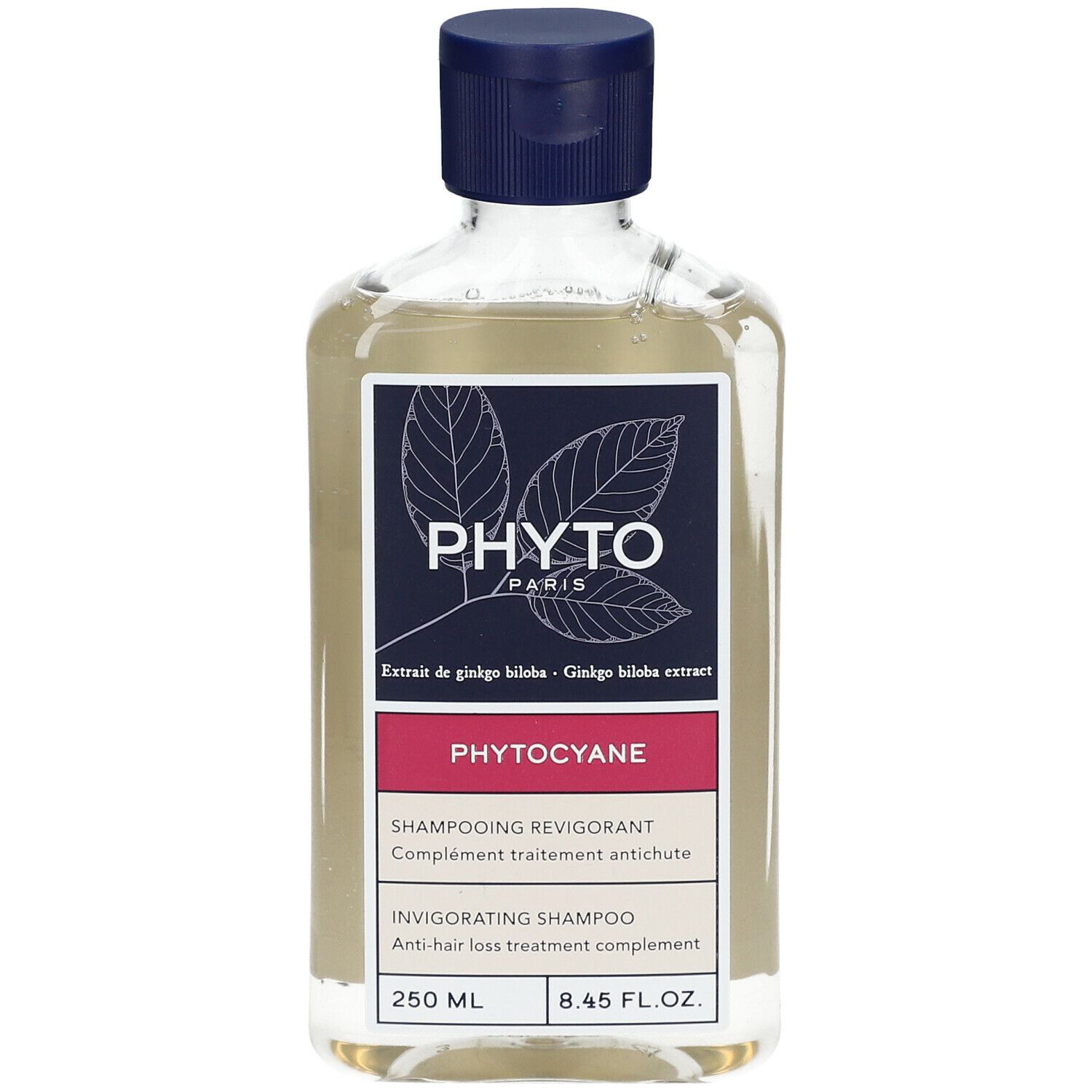 Flacon transparent, bouchon bleu. Étiquette "PHYTO PARIS", "PHYTOCYANE". 250 ml.