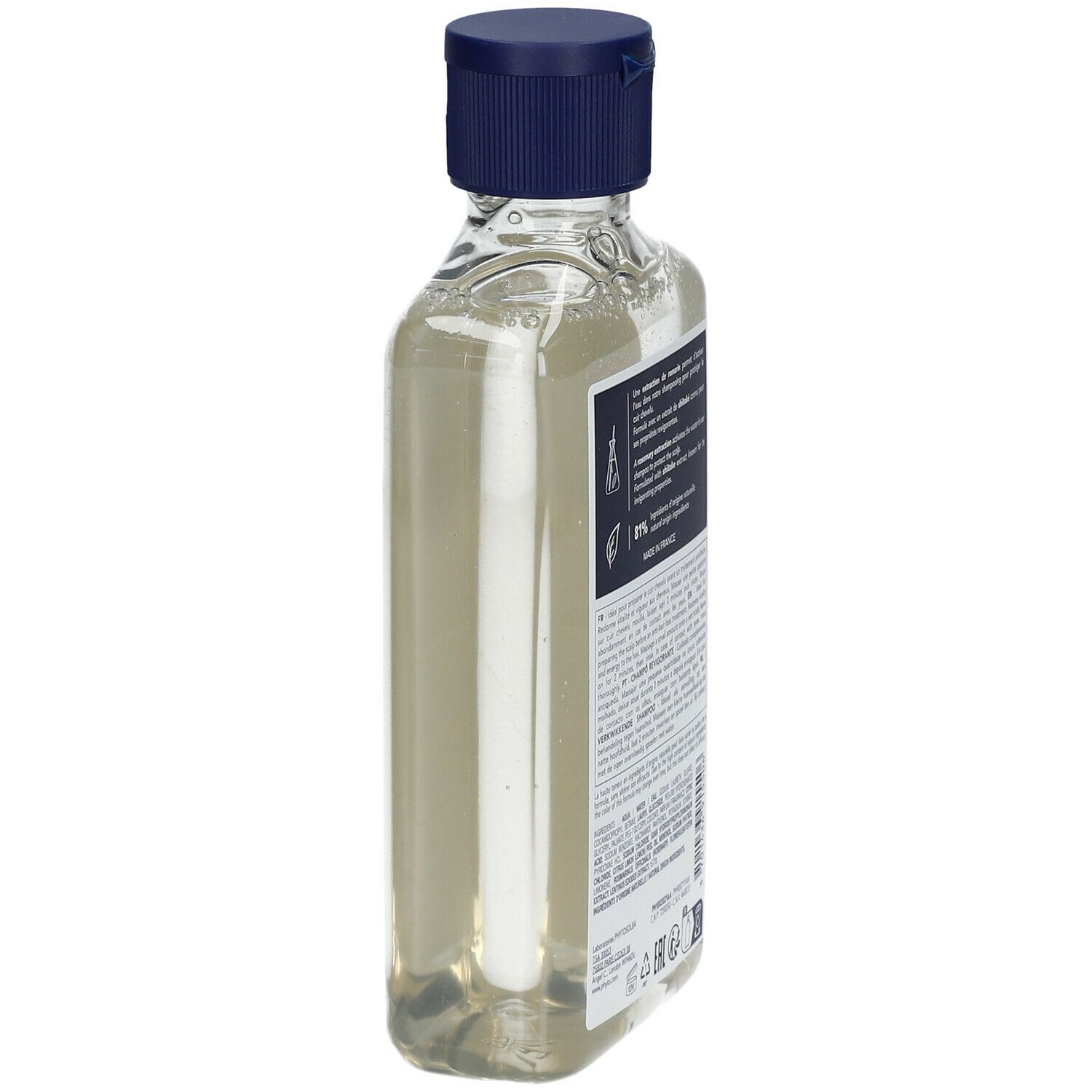 Vue oblique d'un flacon de shampooing avec bouchon bleu et texte sur l'étiquette.