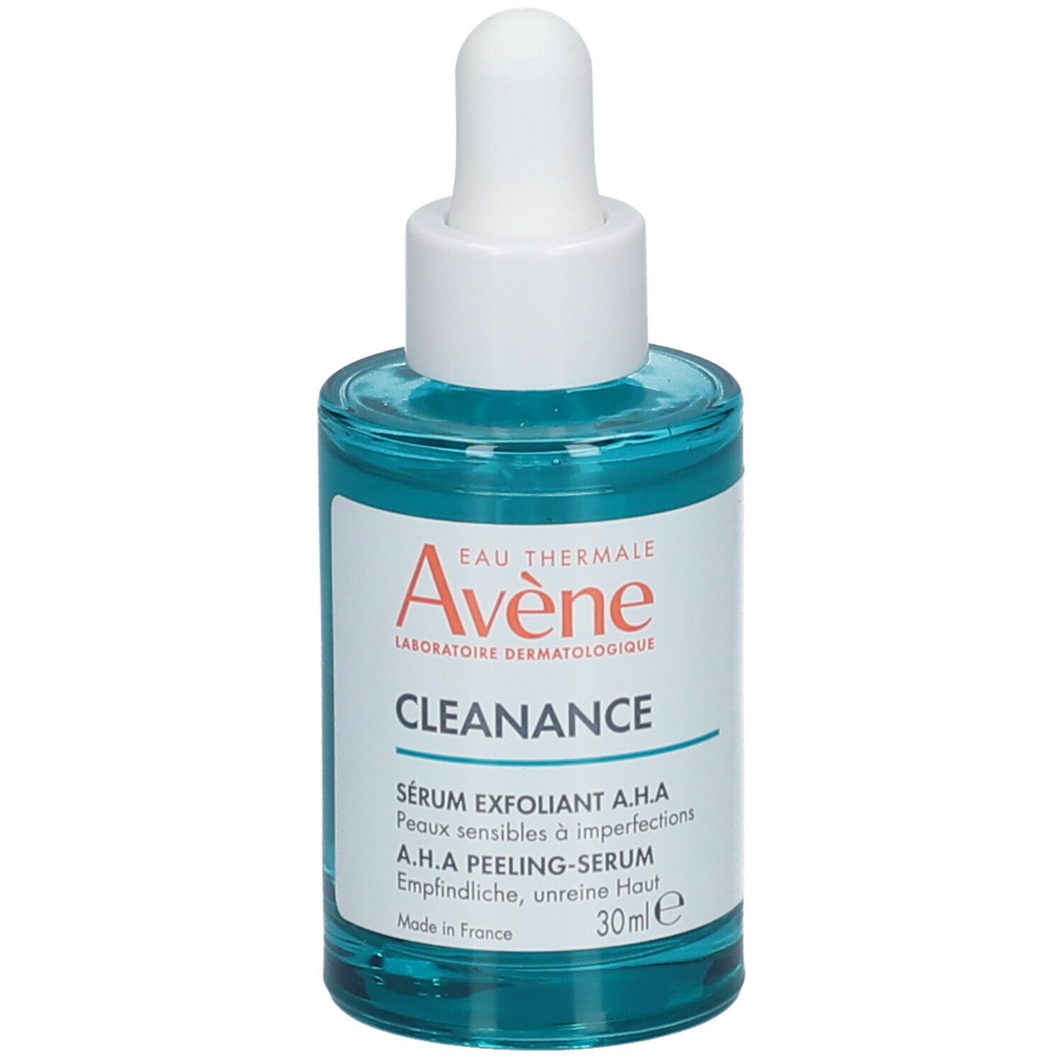 Blauwgroene fles met witte dop en pipet. Opschrift: Avène Cleanance, A.H.A Peeling-Serum, 30ml.