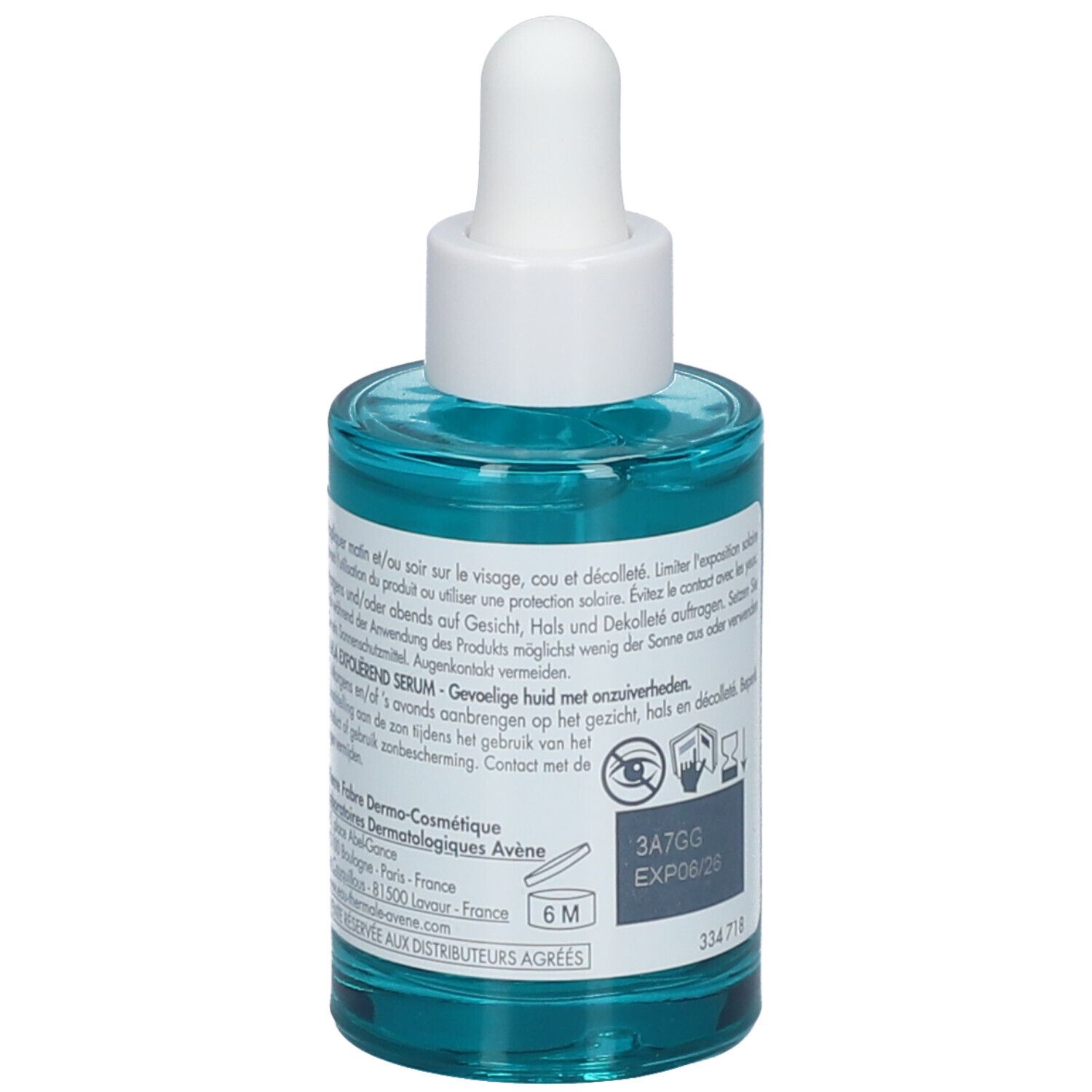 Achterkant van de blauwgroene fles met witte dop en pipet. Tekst en symbolen.
