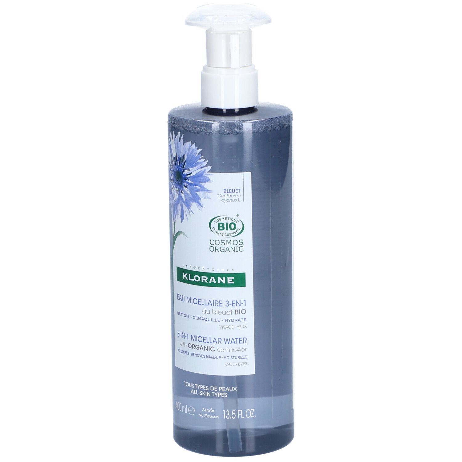 Klorane Eau Micellaire 3-en-1. Flacon avec pompe. Liquide bleu, décor de bleuet.