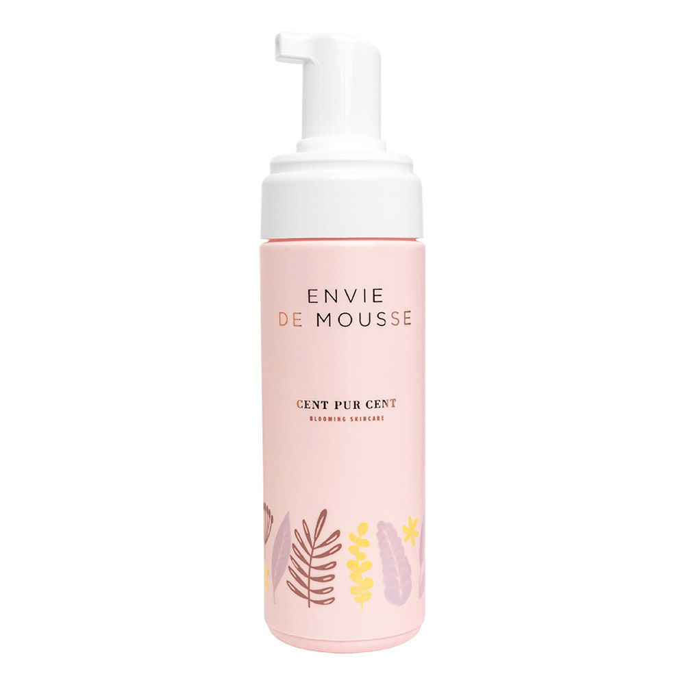 Roze fles met witte pomp. Opschrift: ENVIE DE MOUSSE, CENT PUR CENT. Bloemenmotieven.