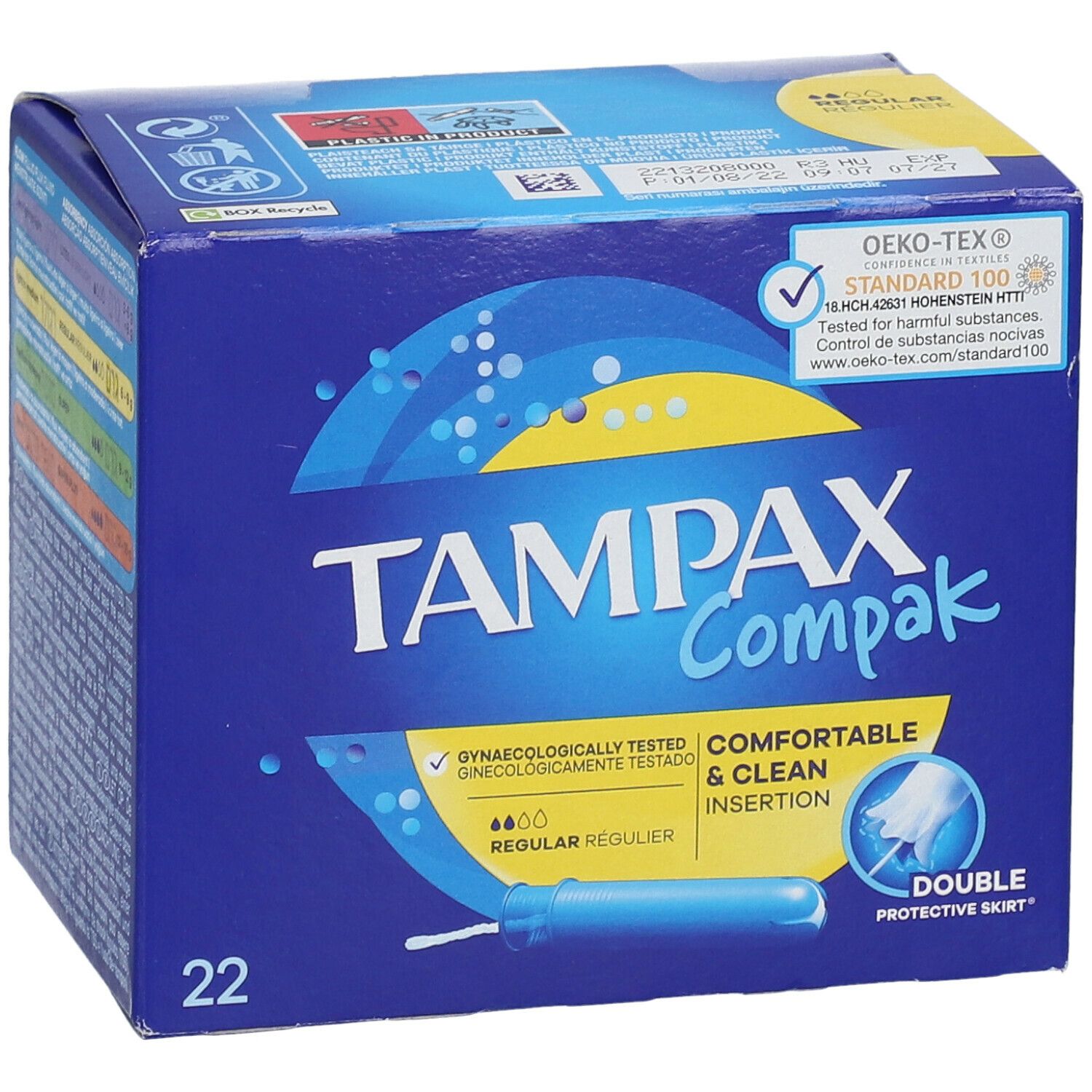 Boîte 'Tampax Compak Regular'. 22 unités. Label 'Oeko-Tex'. 'Testé gynécologiquement'. Bleu et jaune.