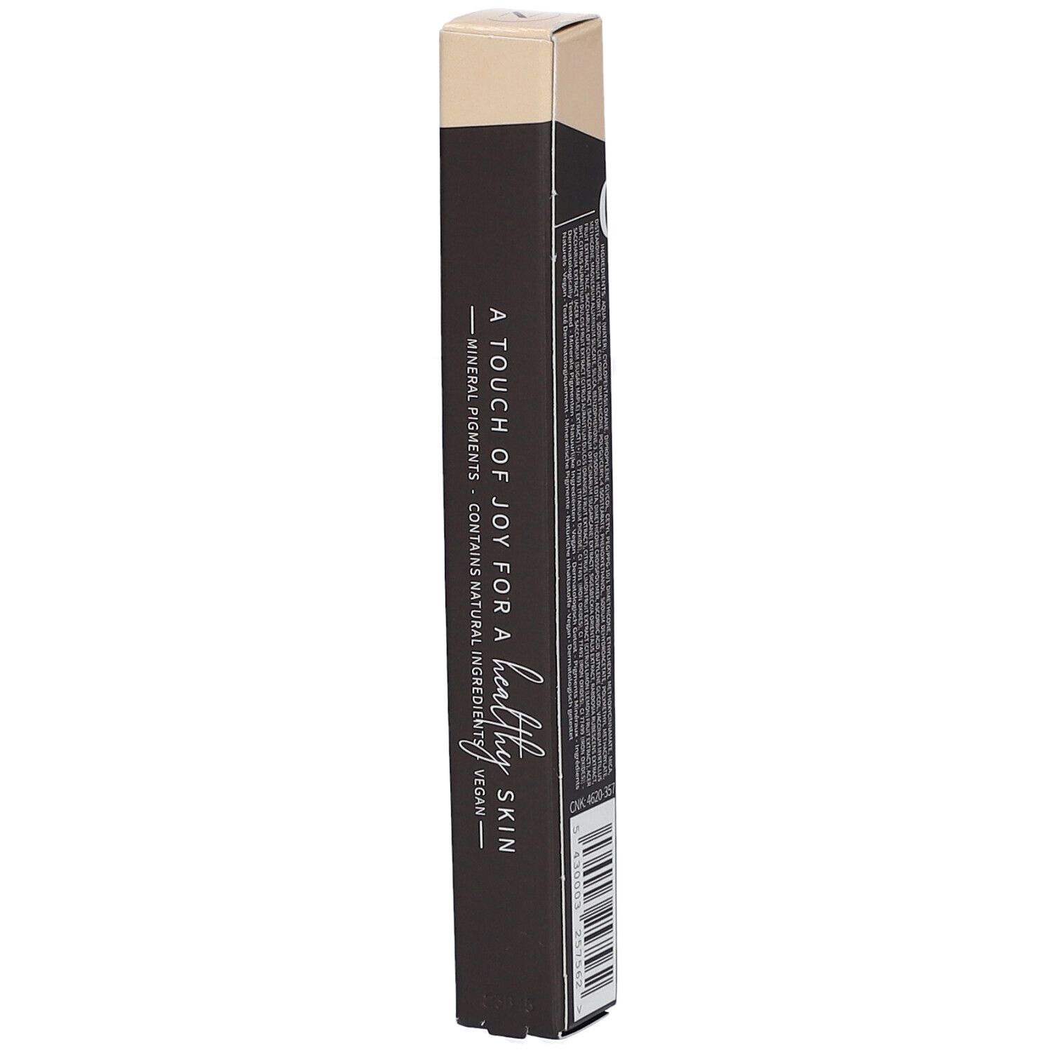 Côté de l'emballage du correcteur. Carton noir avec texte. Inscription : A touch of joy for a healthy skin, vegan.