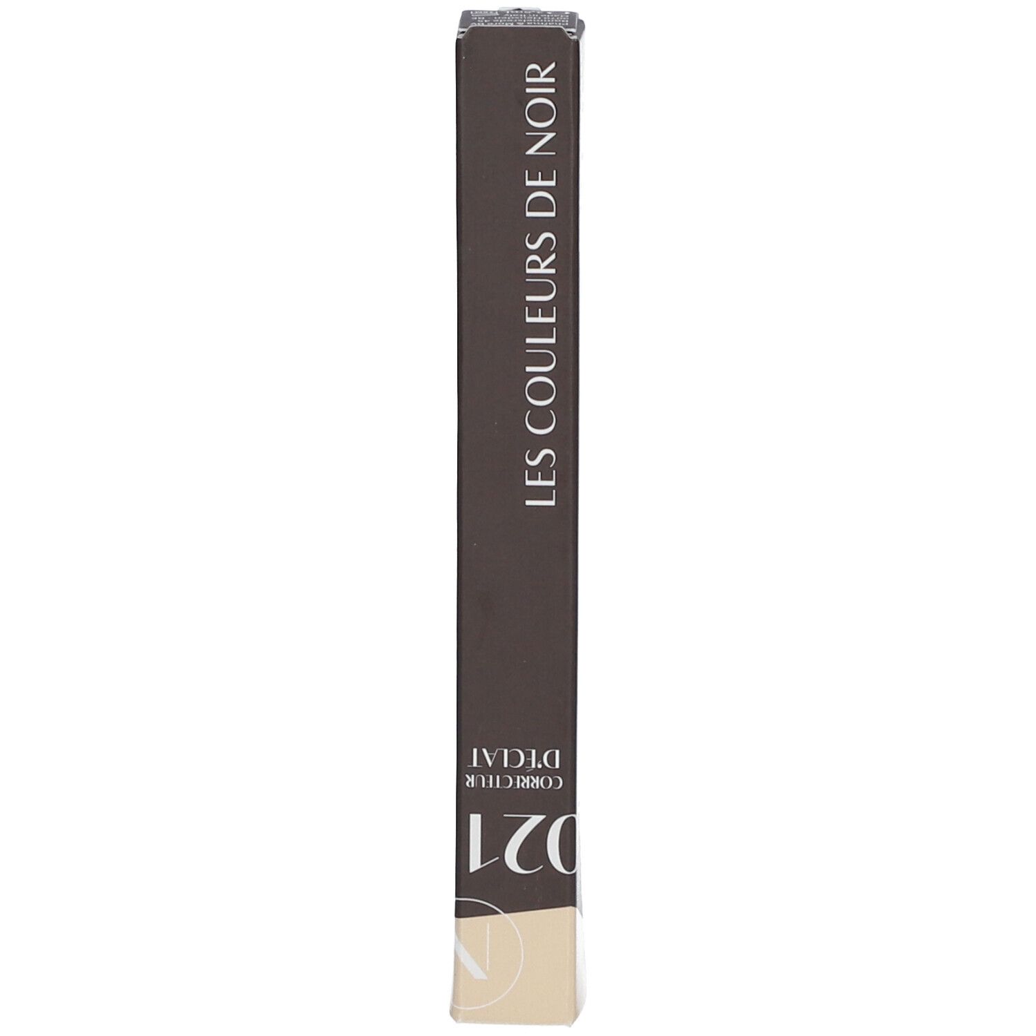 Emballage marron avec informations produit. Texte: LES COULEURS DE NOIR, CORRECTEUR D'ÉCLAT 021.