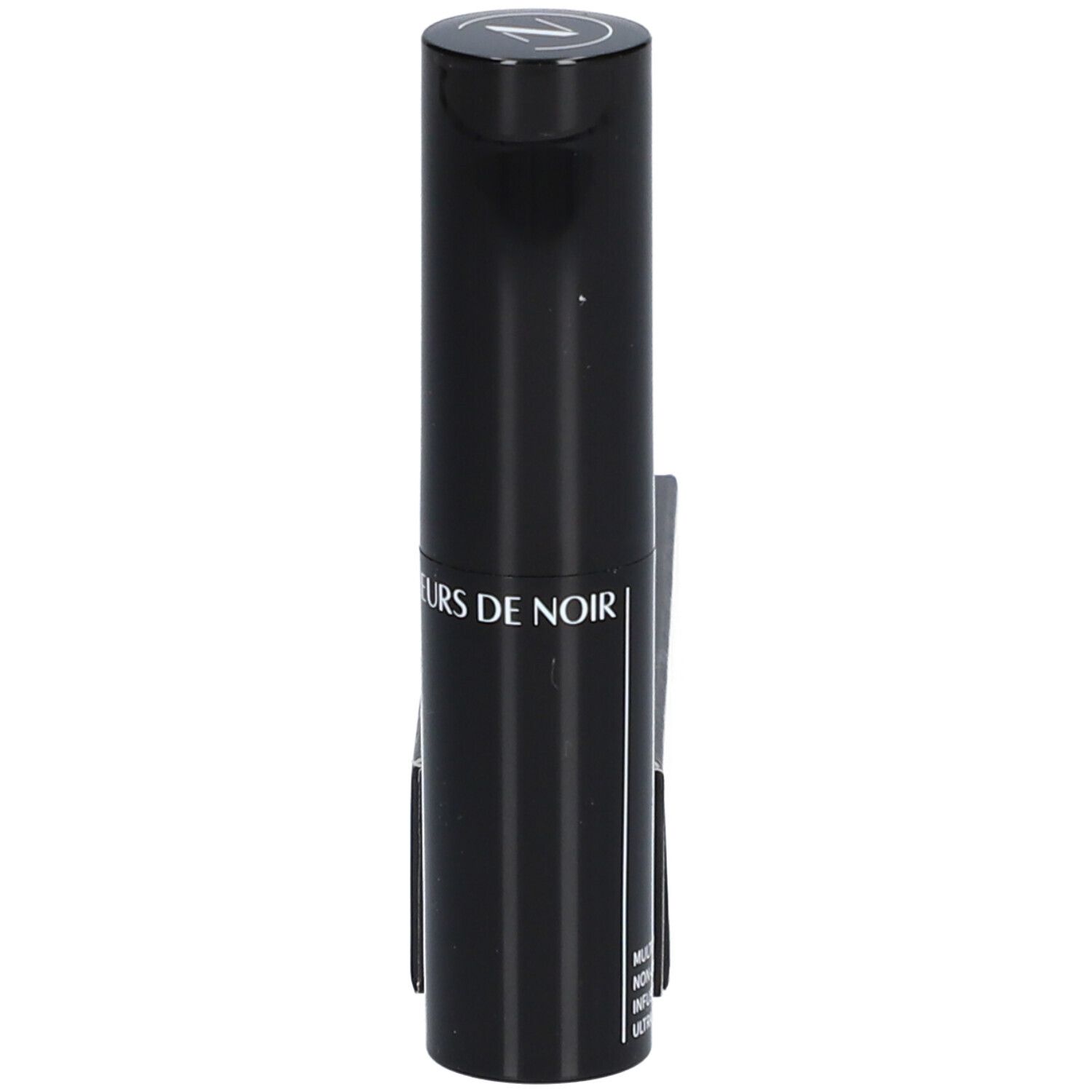 Stick de blush crémeux noir. Inscription : LES COULEURS DE NOIR. Couvercle noir avec 1.