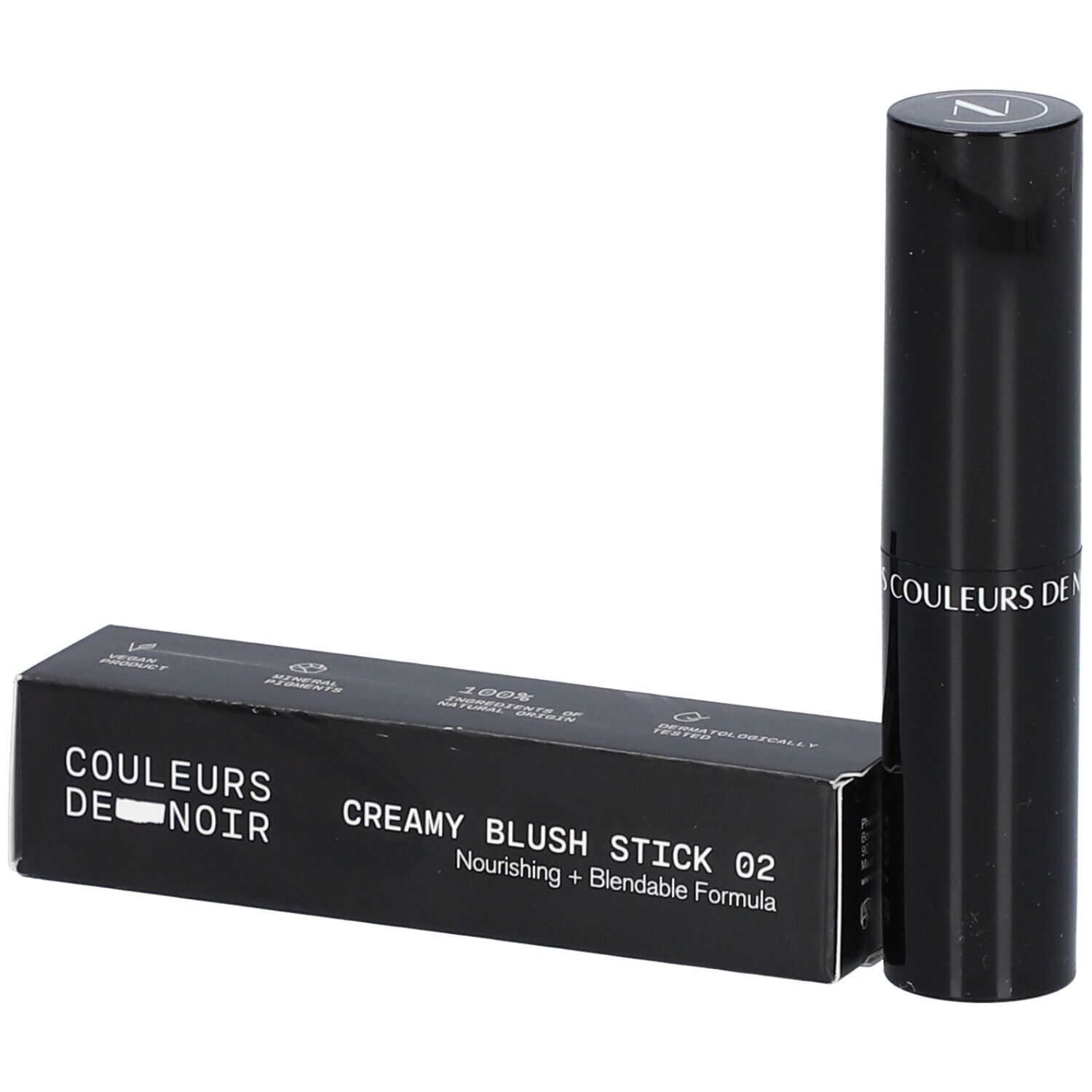 Stick de blush crémeux noir et emballage. Inscription: COULEURS DE NOIR, CREAMY BLUSH STICK 02 Soft Pink.