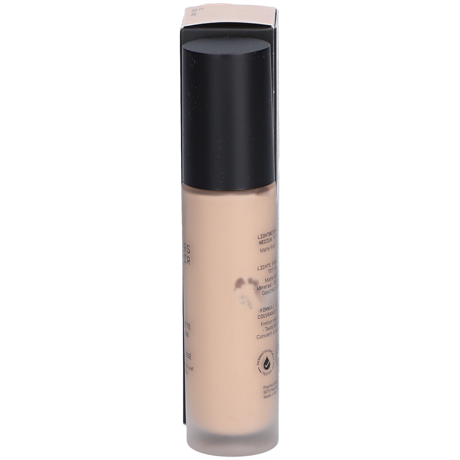 Flacon de fond de teint. Texte: Lightweight formula, matte finish. Sceau végan.