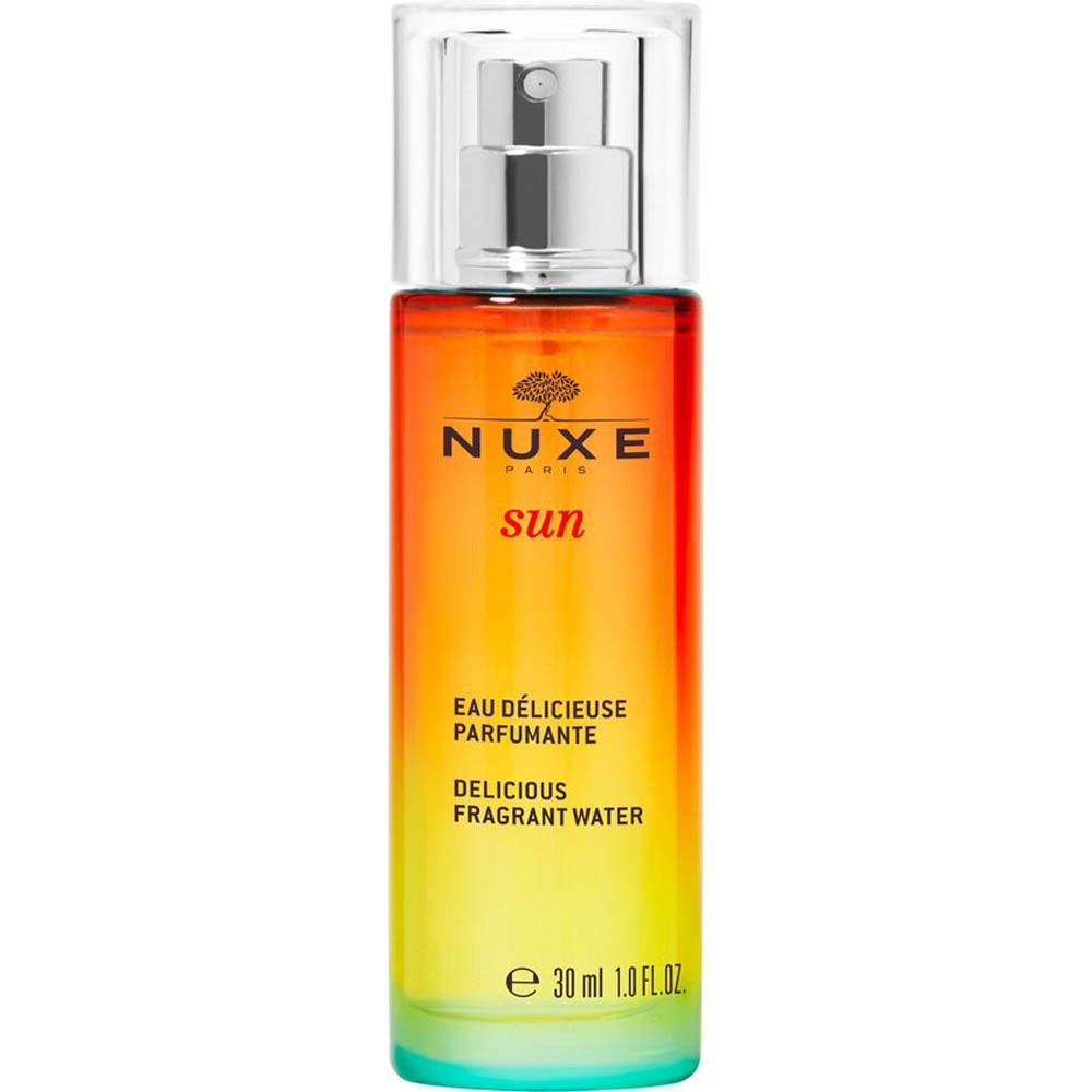 Parfumfles met kleurovergang. Opschrift: Nuxe Sun, Eau Délicieuse Parfumante, Delicious Fragrant Water. Met verstuiver en dop.