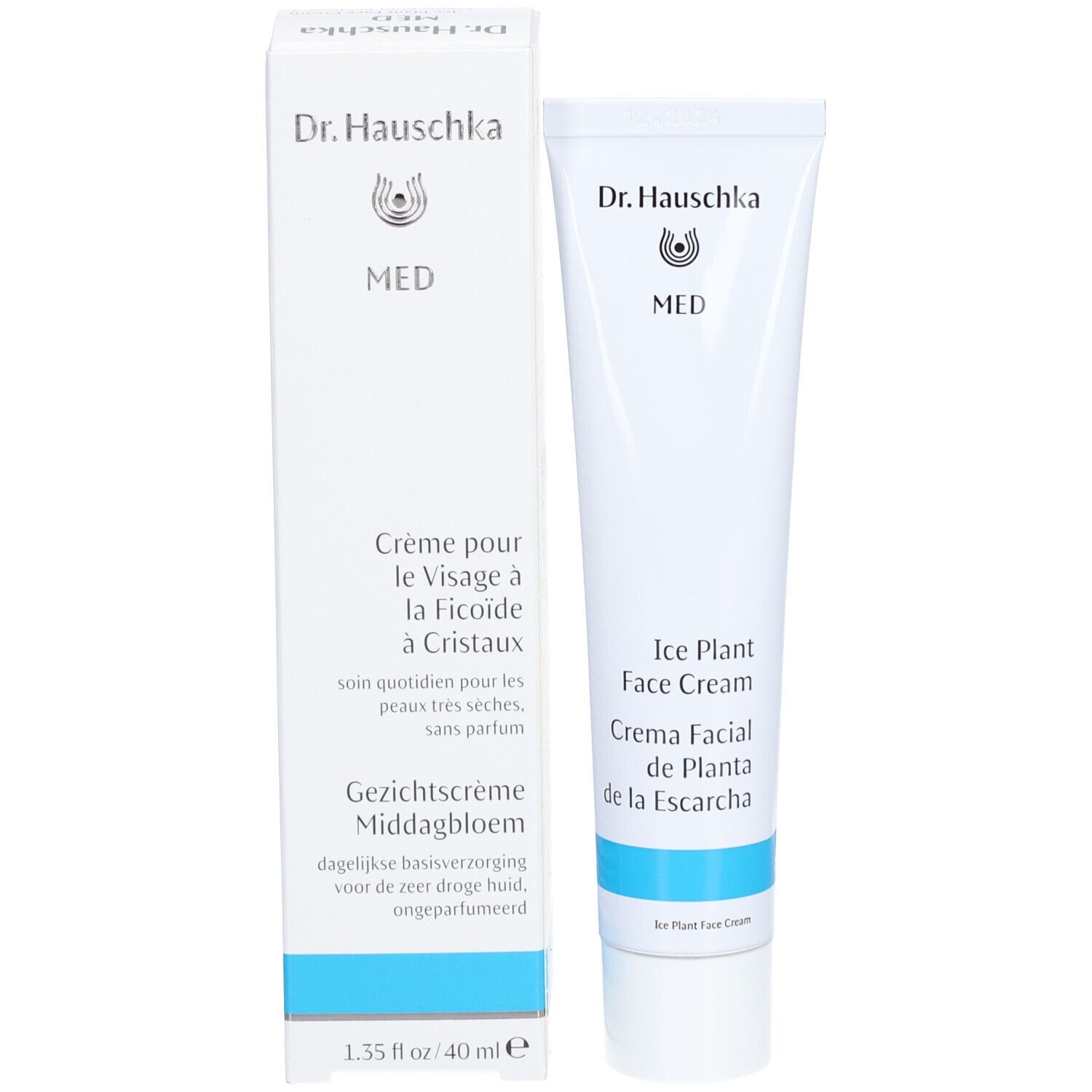 Weiße Tube und Schachtel. Aufschrift: Dr. Hauschka, MED, Crème pour le Visage à la Ficoïde à Cristaux, Gezichtscrème Middagbloem.