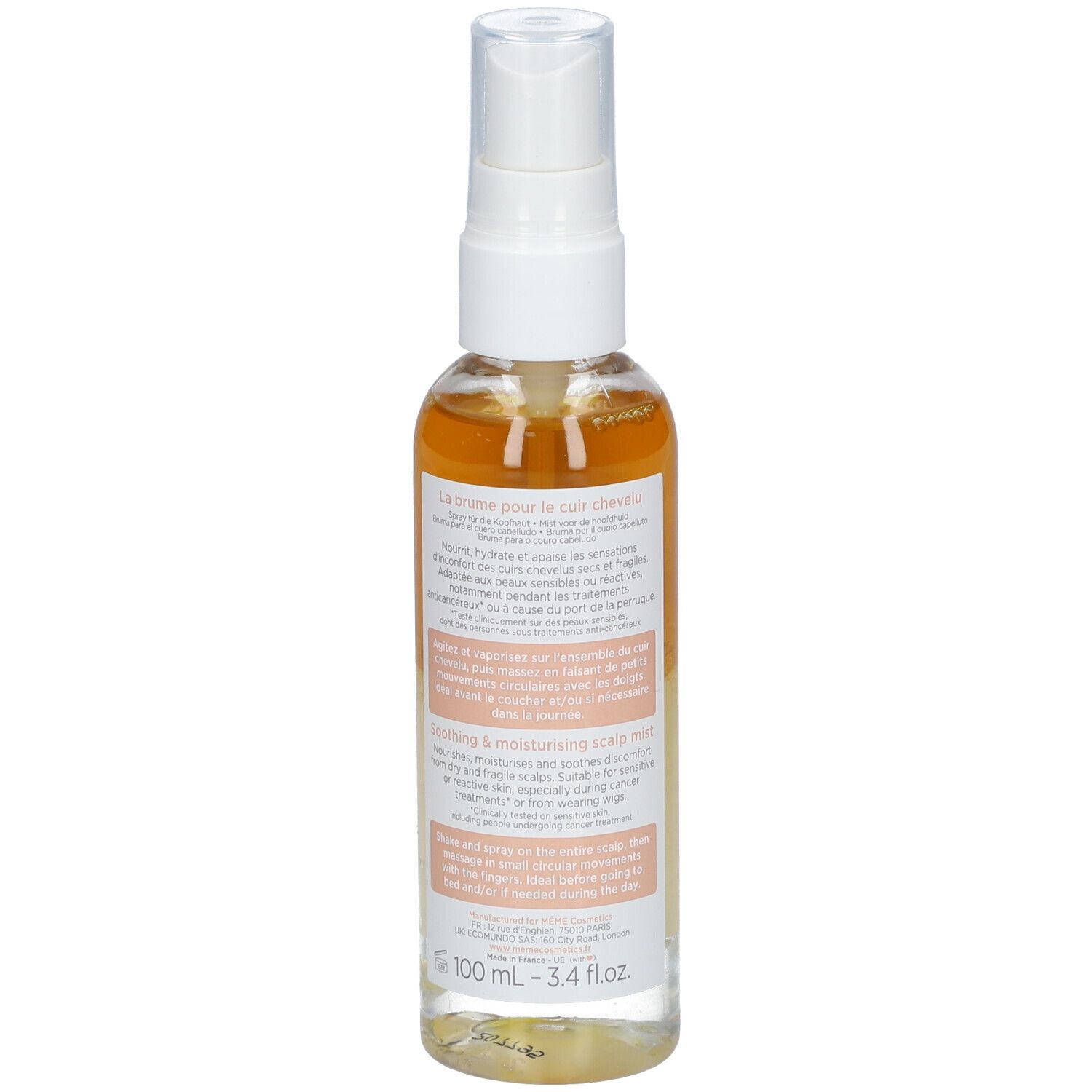 Flacon spray transparent, bouchon blanc. Étiquette avec texte et logo. Liquide ambré.