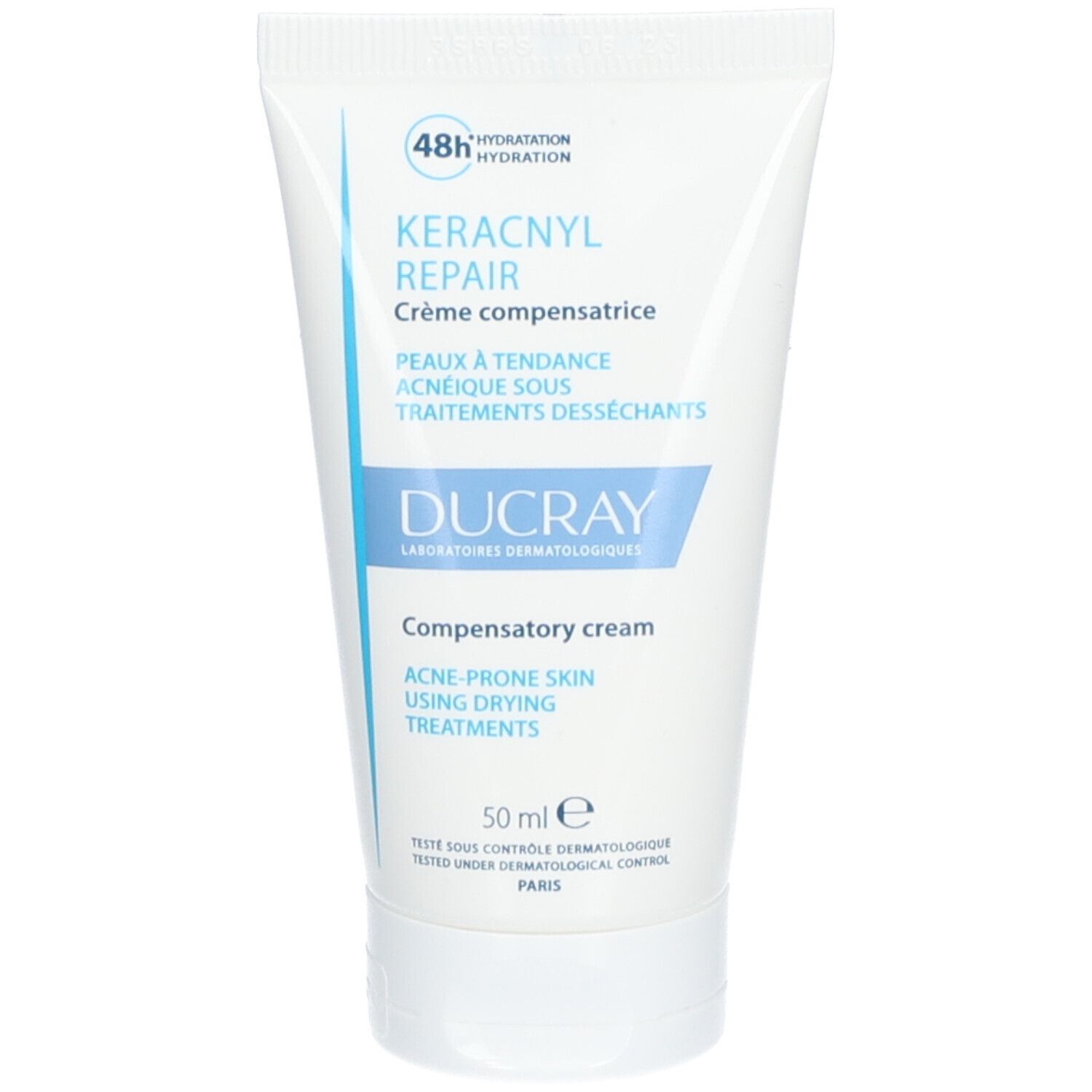 Witte tube DUCRAY KERACNYL REPAIR Crème compensatrice. Blauwe tekst. 48h Hydratation. 50 ml.