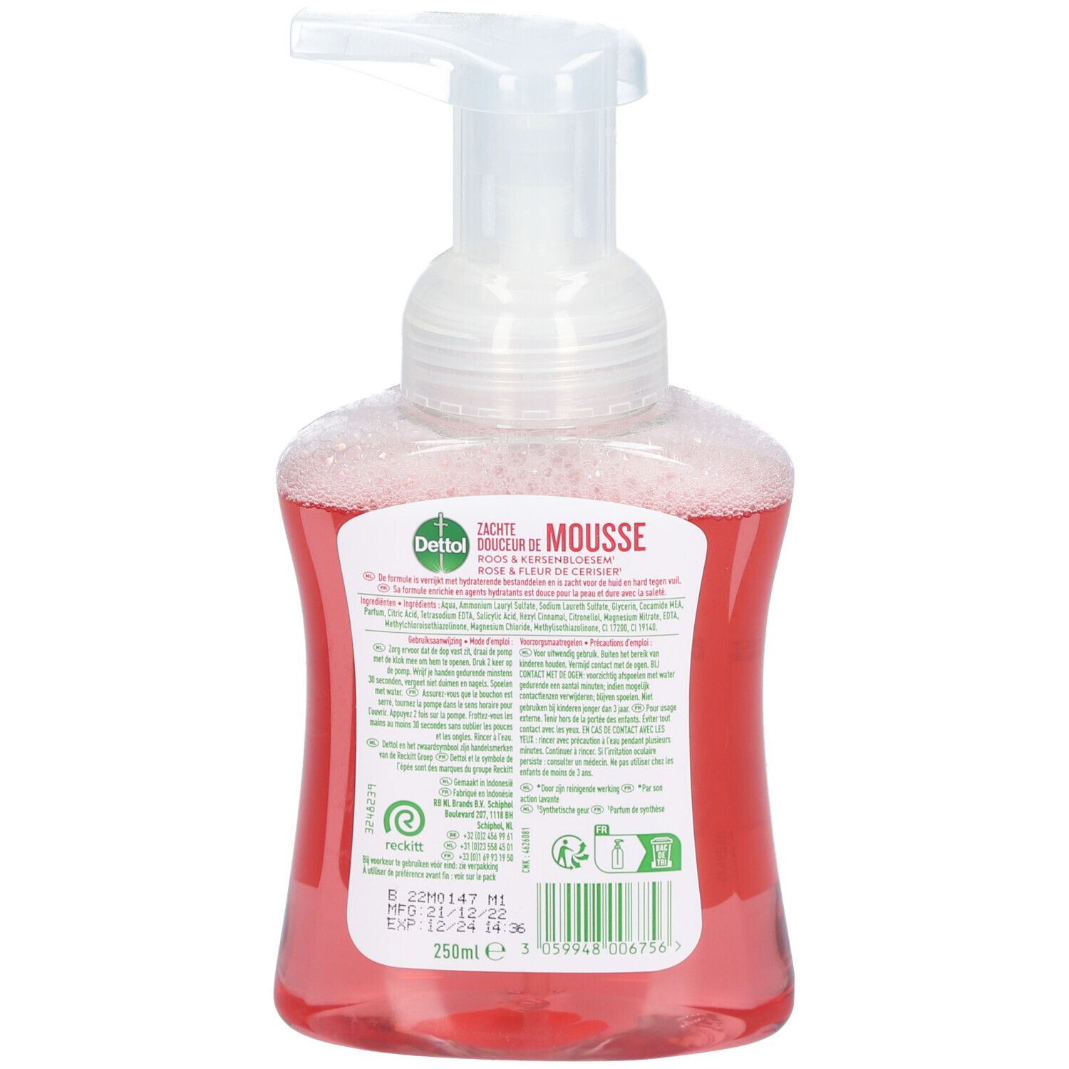 Achterkant van handzeep met dispenser. Roze vloeistof zichtbaar. Tekstinformatie en logo's.