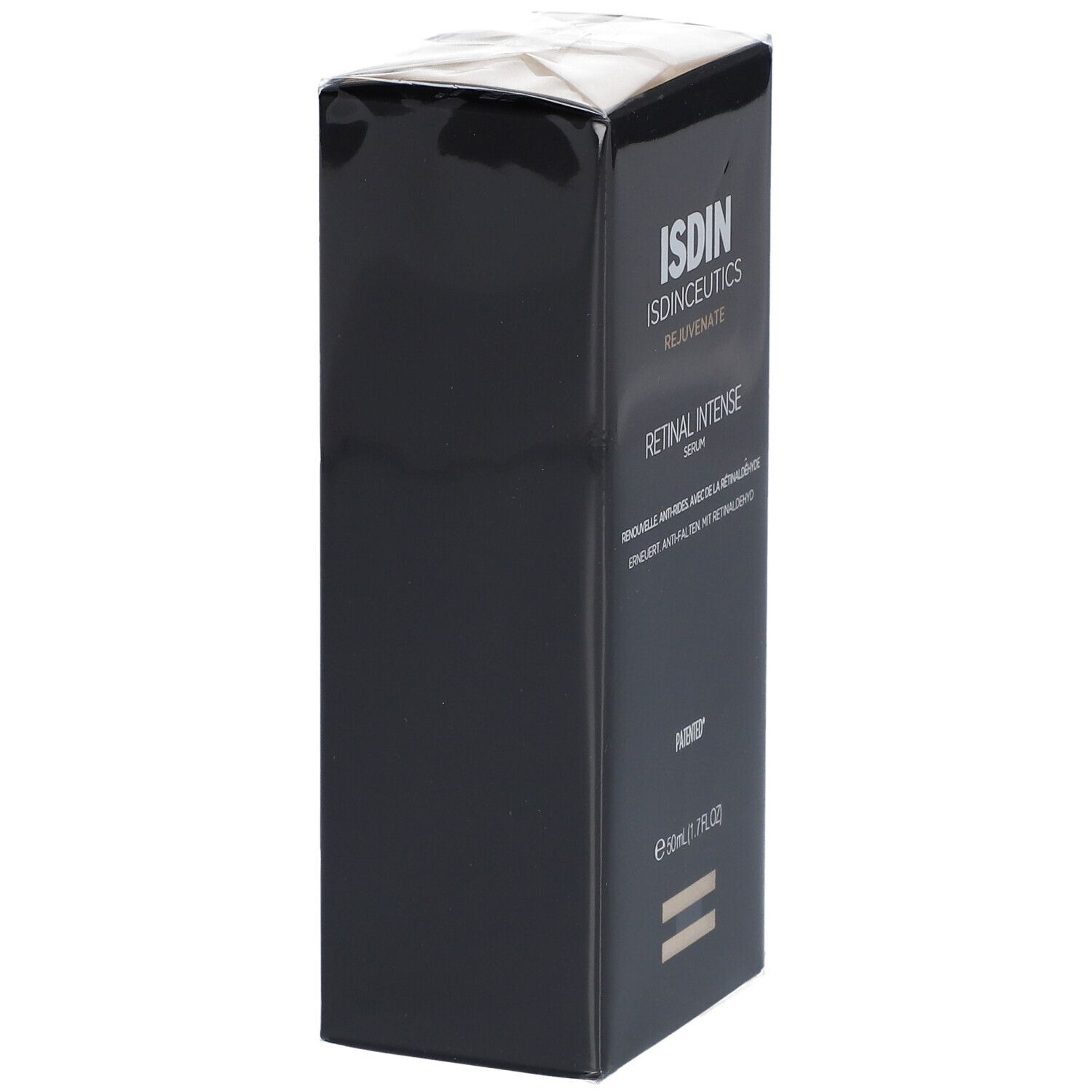 Vue latérale d'une boîte noire. Nom du produit et marque visibles. Emballage sous film plastique.