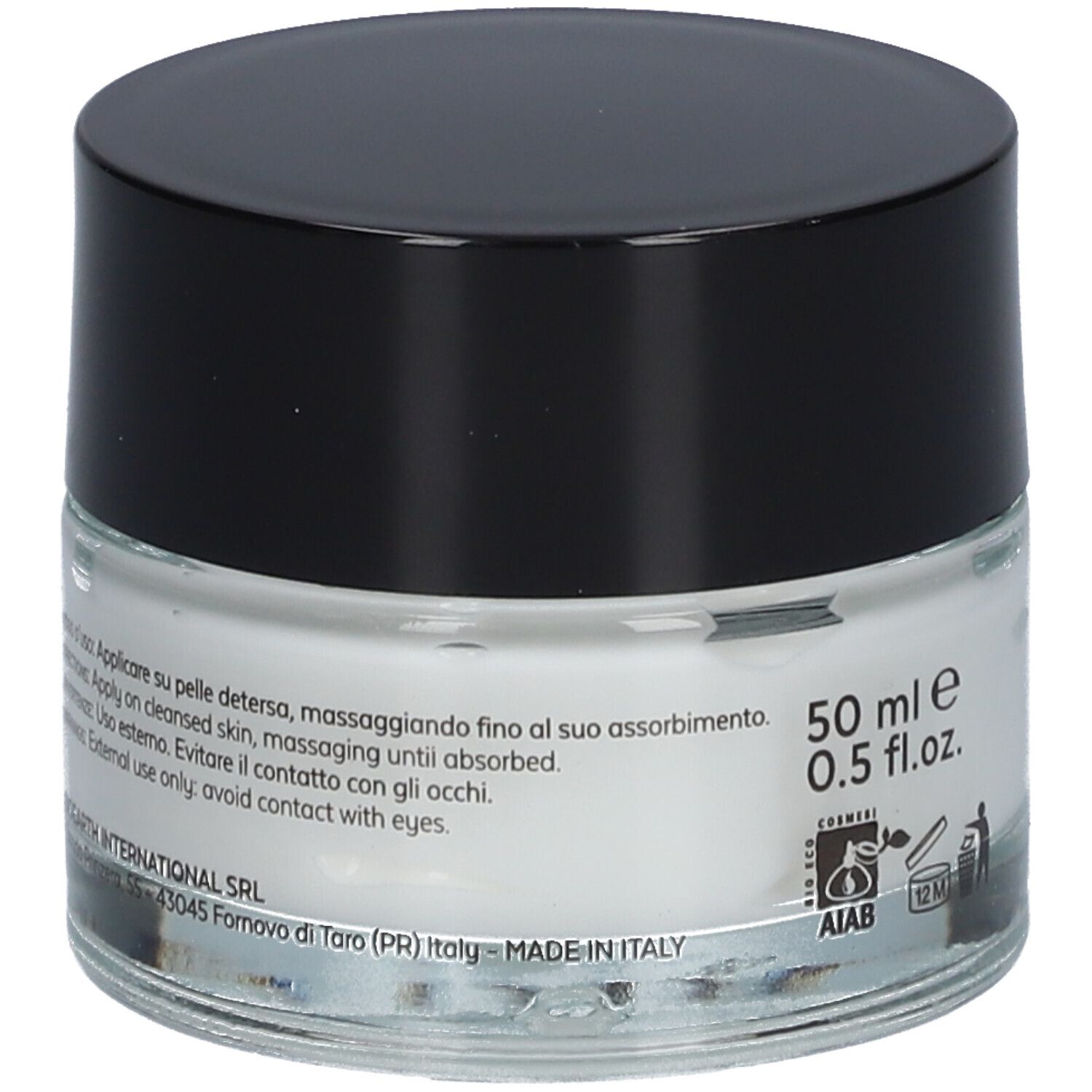 Creme-Tiegel mit schwarzem Deckel. Aufschrift: 50 ml, 0.5 fl.oz. Text und Symbole.