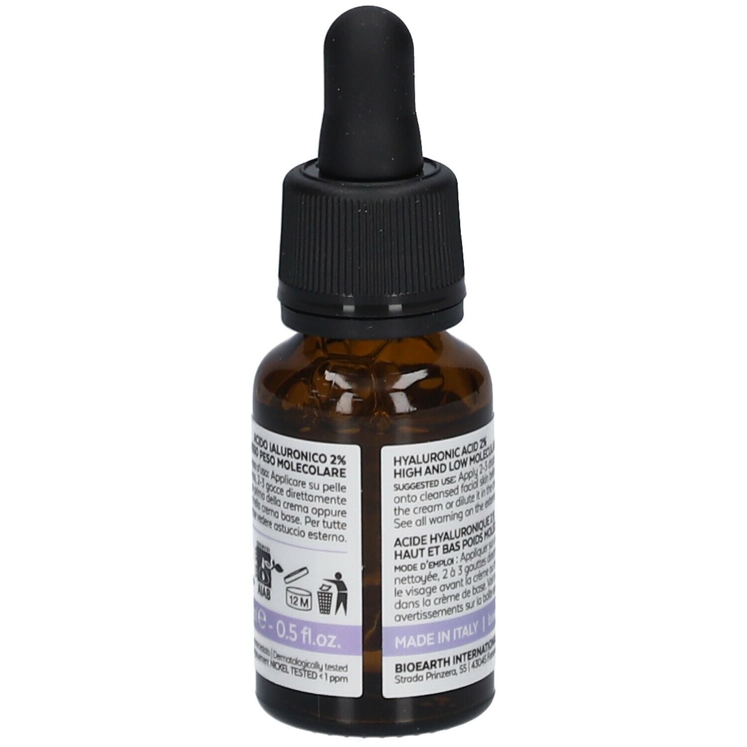 Flacon en verre brun avec bouchon noir et pipette. Étiquette avec informations et marque du produit.