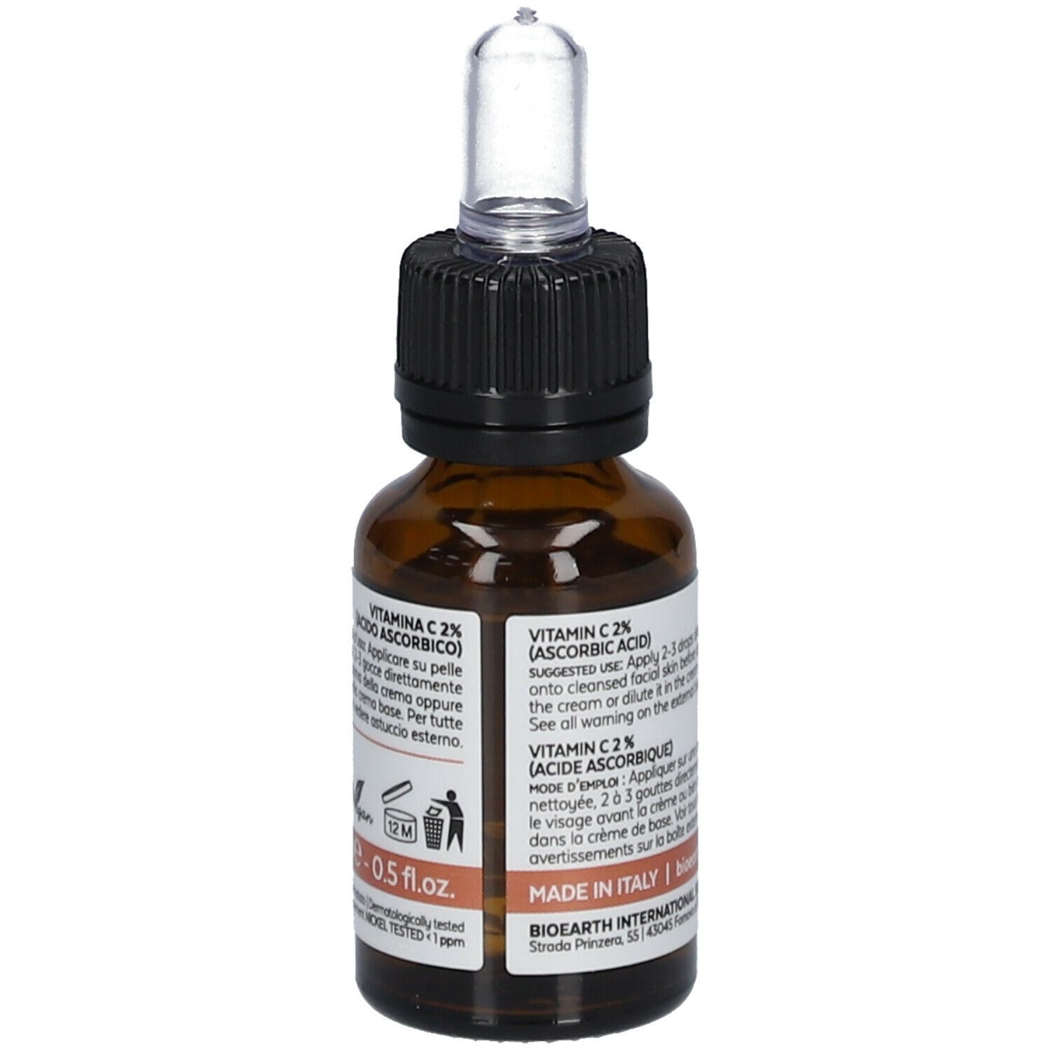 Bruine glazen fles met pipet. Etiket met tekst en Elementa Vitamine C 2%.