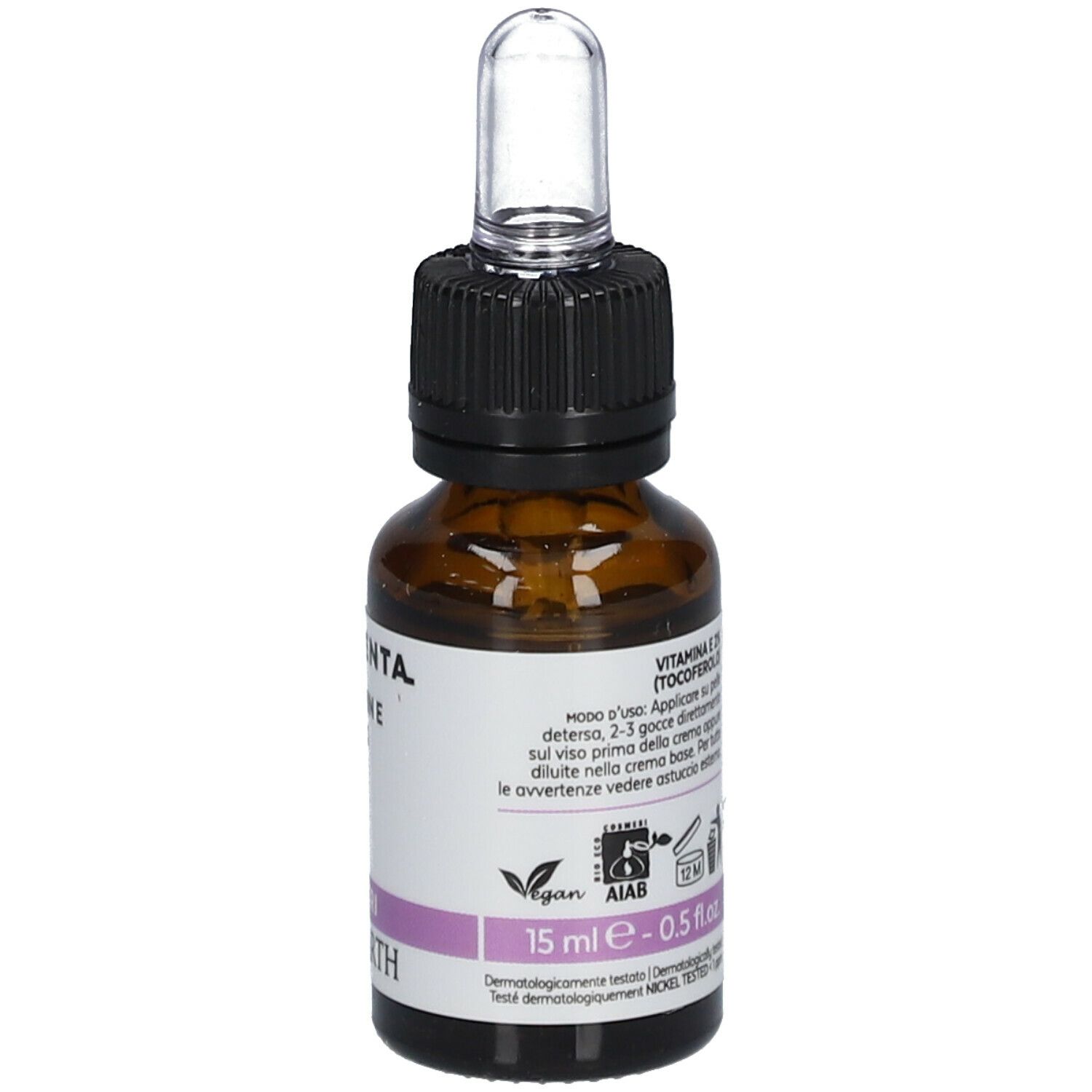 Bruine glazen fles met pipet. Label met tekst, "15 ml - 0.5 fl.oz" en logo's.