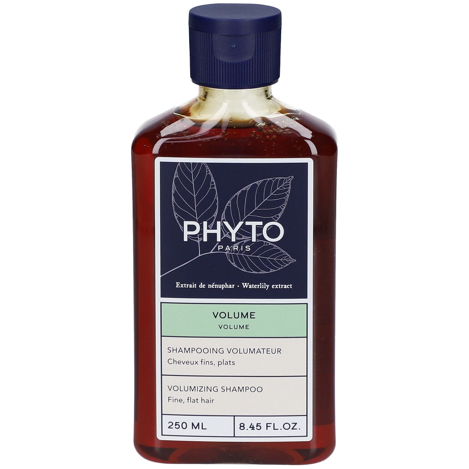 Bruine fles met blauwe dop. Label met "PHYTO PARIS" en "VOLUME". Inhoud 250 ml.