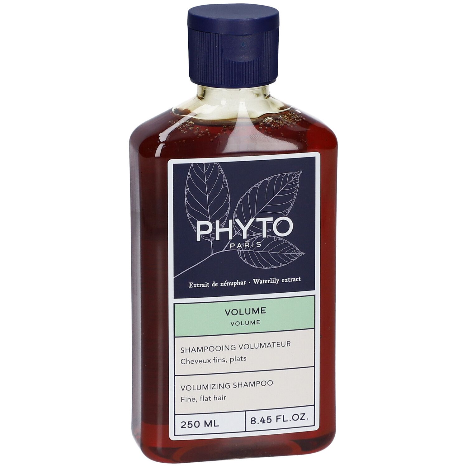Bruine fles met blauwe dop. Label met "PHYTO PARIS" en "VOLUME". Inhoud 250 ml.