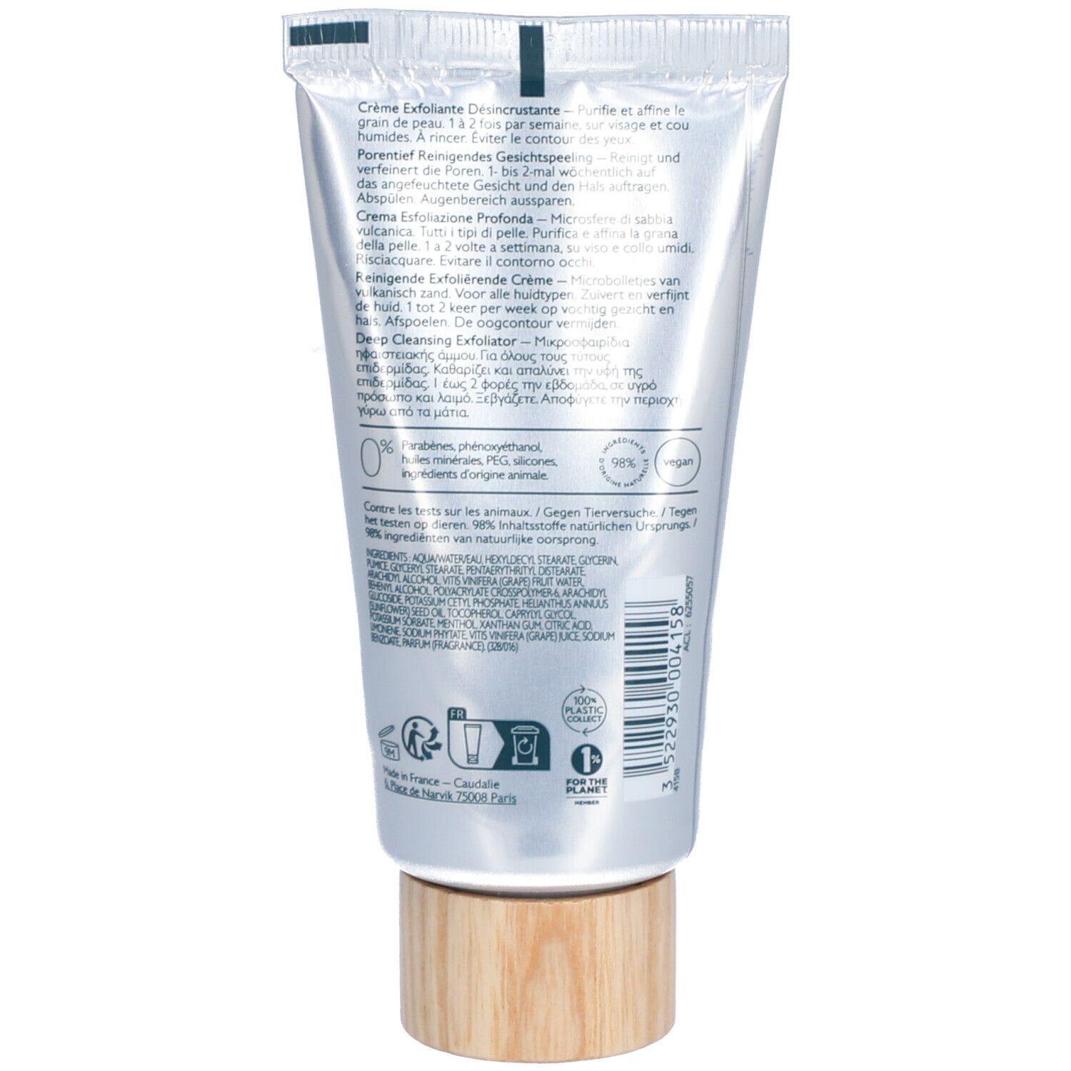 Creme-Tube mit Holzfuß. Text in mehreren Sprachen. Vegan- und Recycling-Siegel.