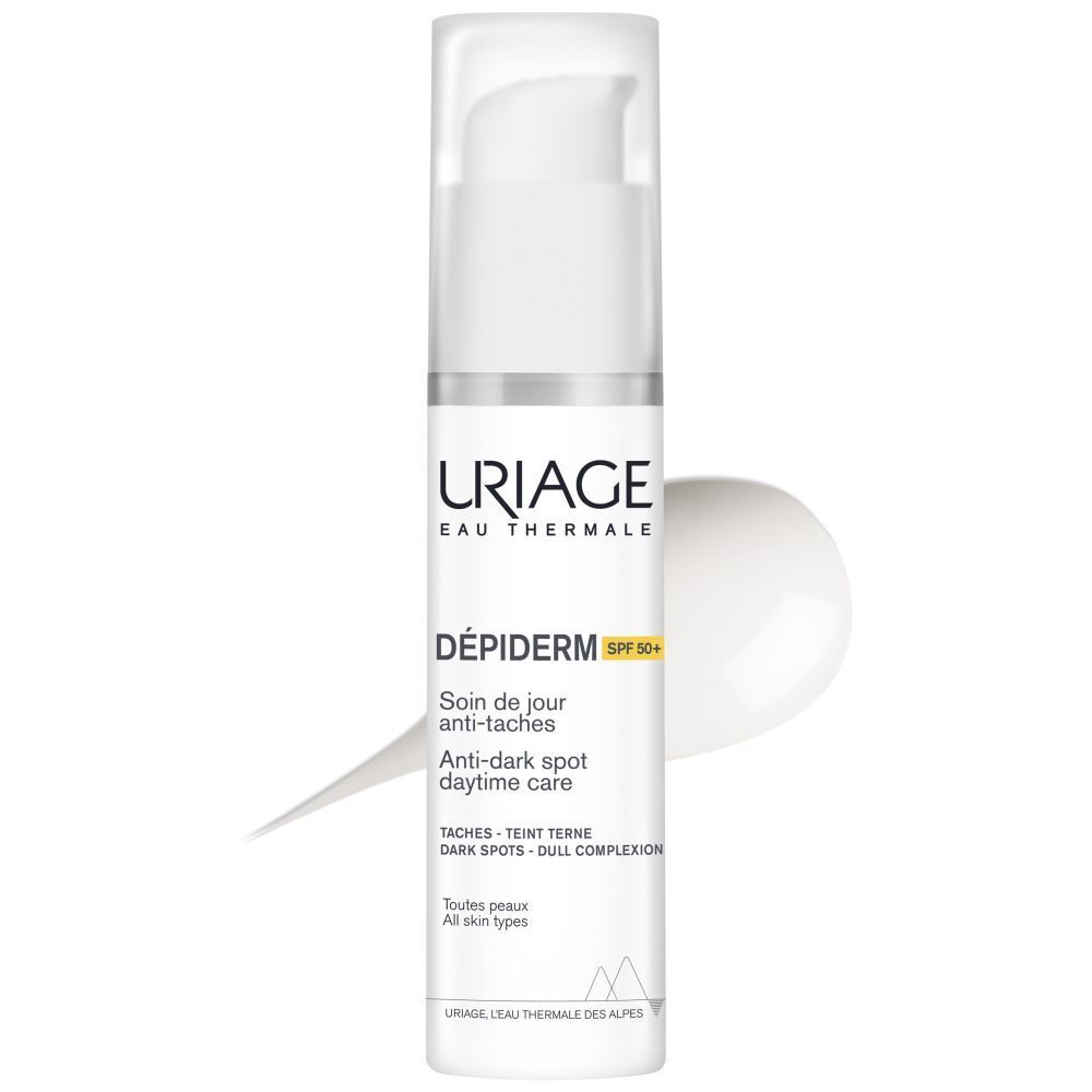 Flacon blanc Uriage Dépiderm. Texte: Dépiderm, SPF50+, soin anti-taches. Bouchon blanc. Vue de face.