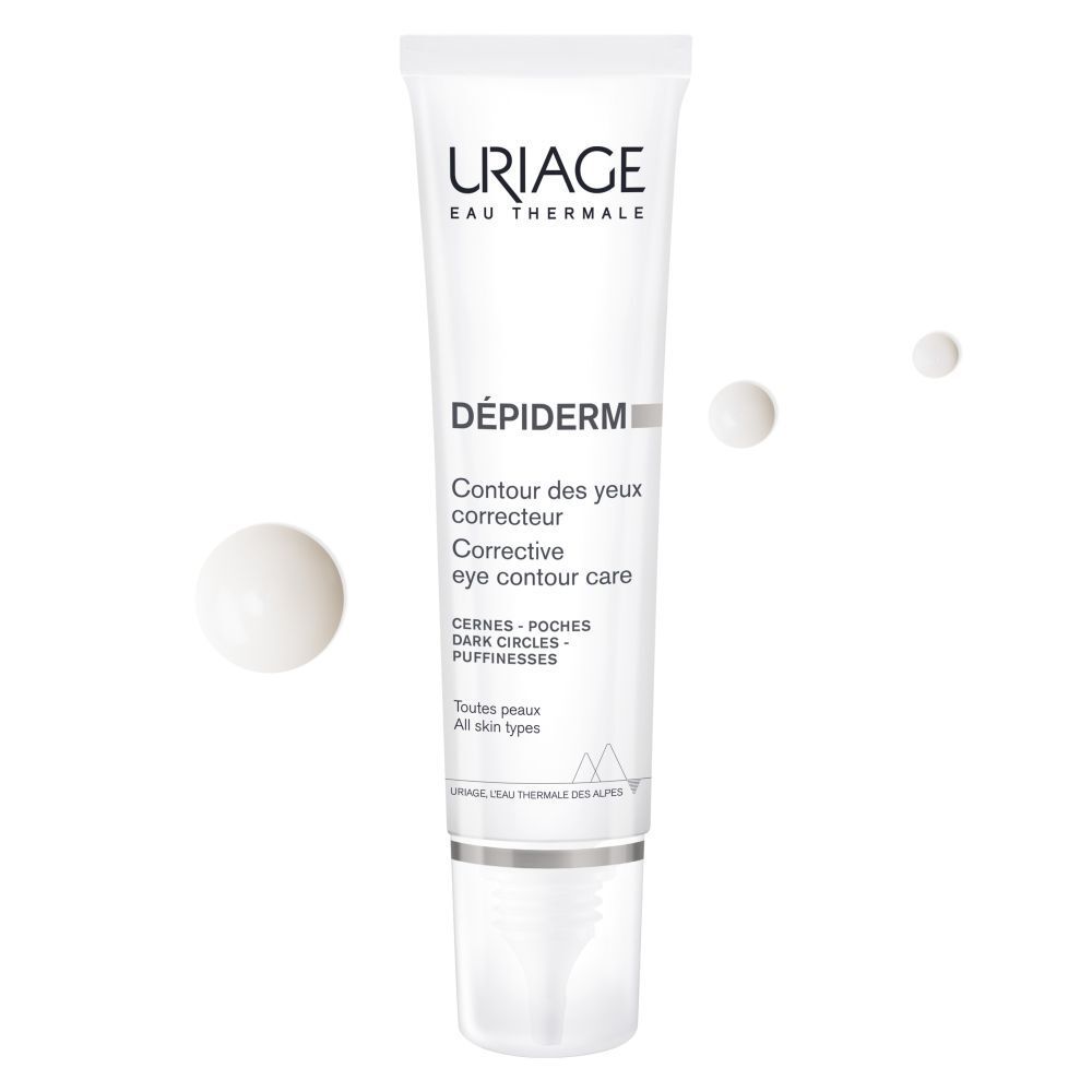 Tube blanc URIAGE DÉPIDERM, soin contour des yeux. Inscriptions en français et anglais. Gouttes à côté.