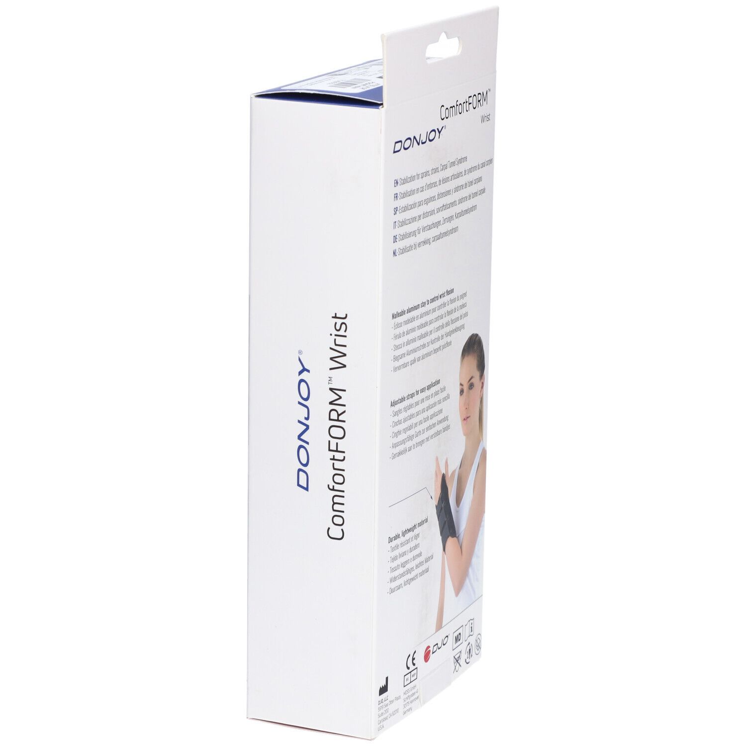 Verpakking met polsbrace. Merk: DonJoy ComfortFORM. Productbeschrijving. Vrouw met polsbrace.