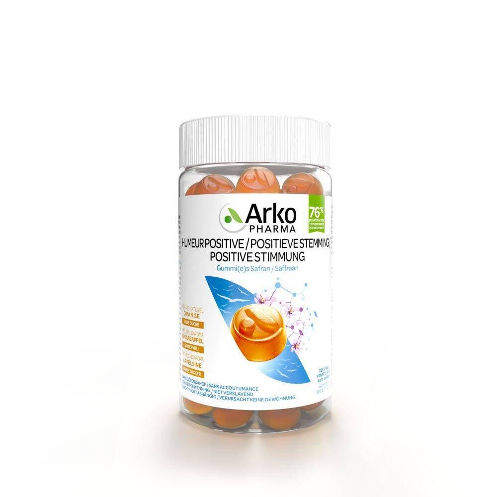 Boîte en plastique transparente avec bonbons gélifiés orange. Inscription: Arkopharma Humeur Positive. Couvercle blanc.