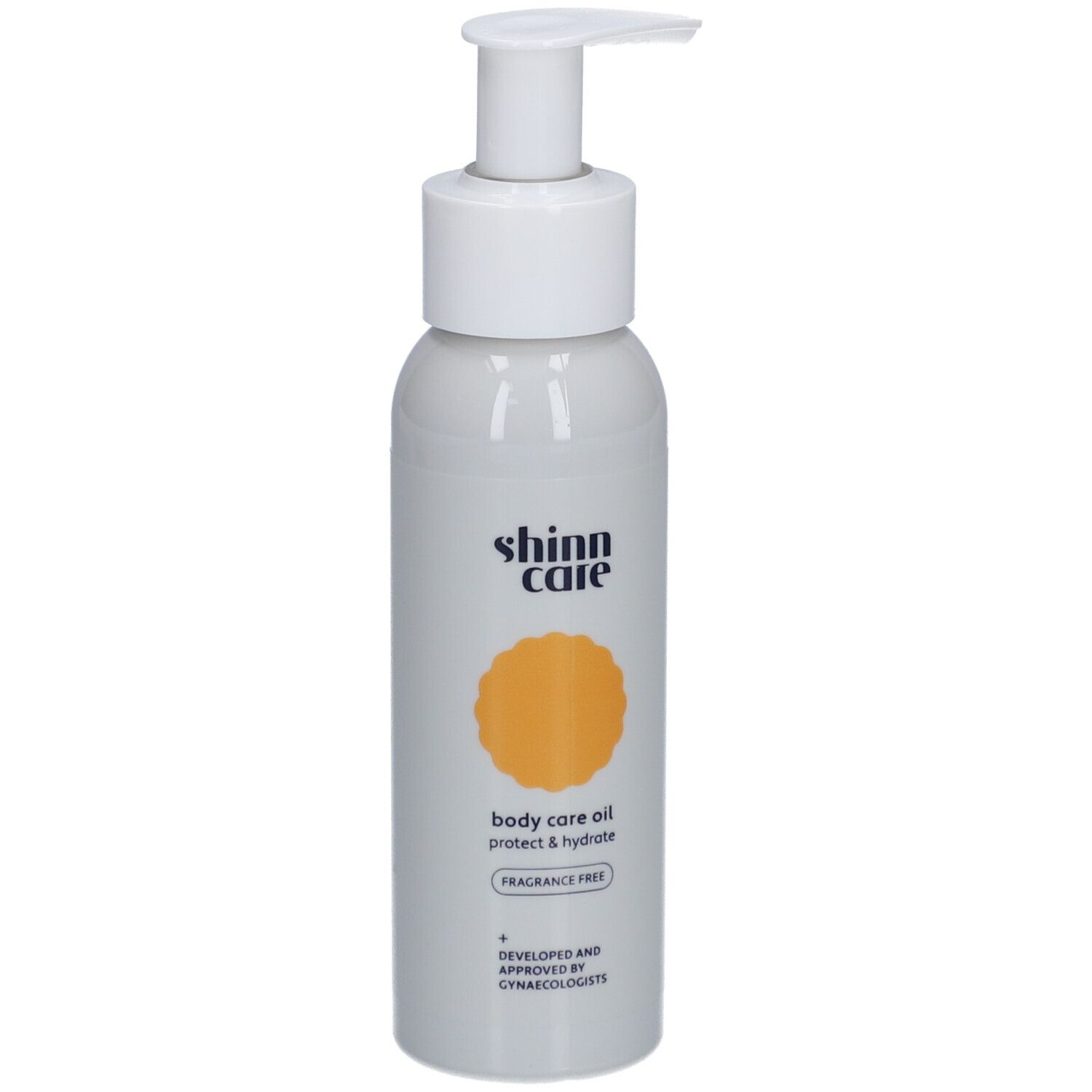 Graue Flasche mit weißem Pumpkopf. Aufschrift: shinn care, body care oil, protect & hydrate, fragrance free.