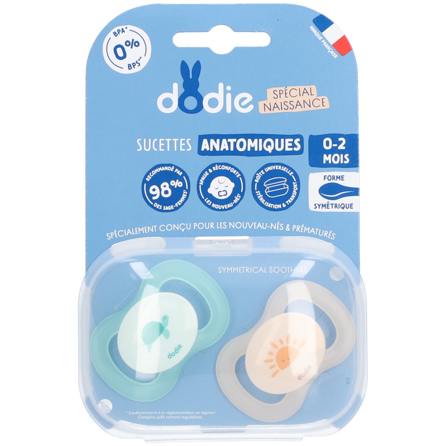 Zwei Schnuller in Verpackung. Blau-transparente Verpackung. Aufschrift: Dodie, Anatomique, 0-2 Monate. Zwei Schnuller.