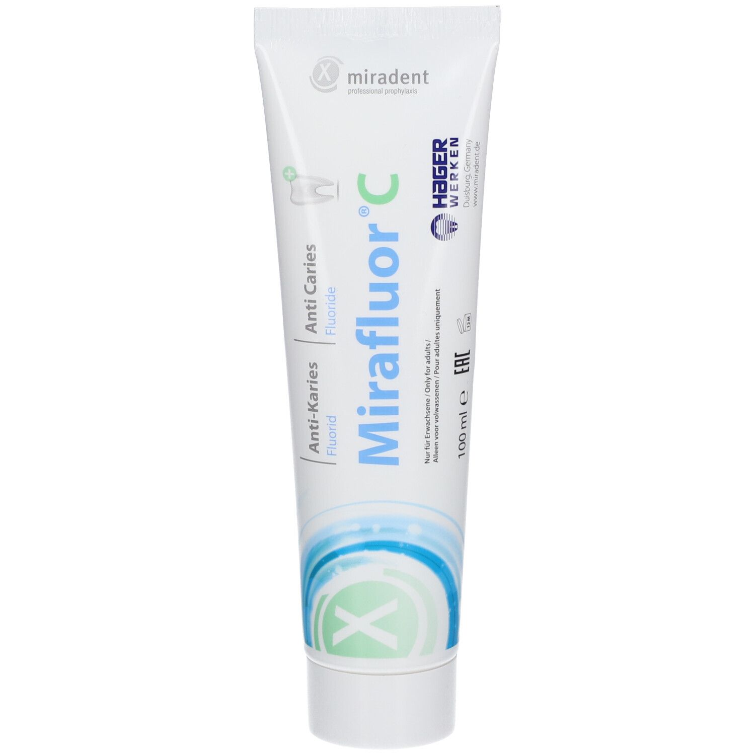 Tandpasta tube Miradent Mirafluor C, wit-blauw. Tekst: Anti-cariës, Fluoride. Logo en tekst.