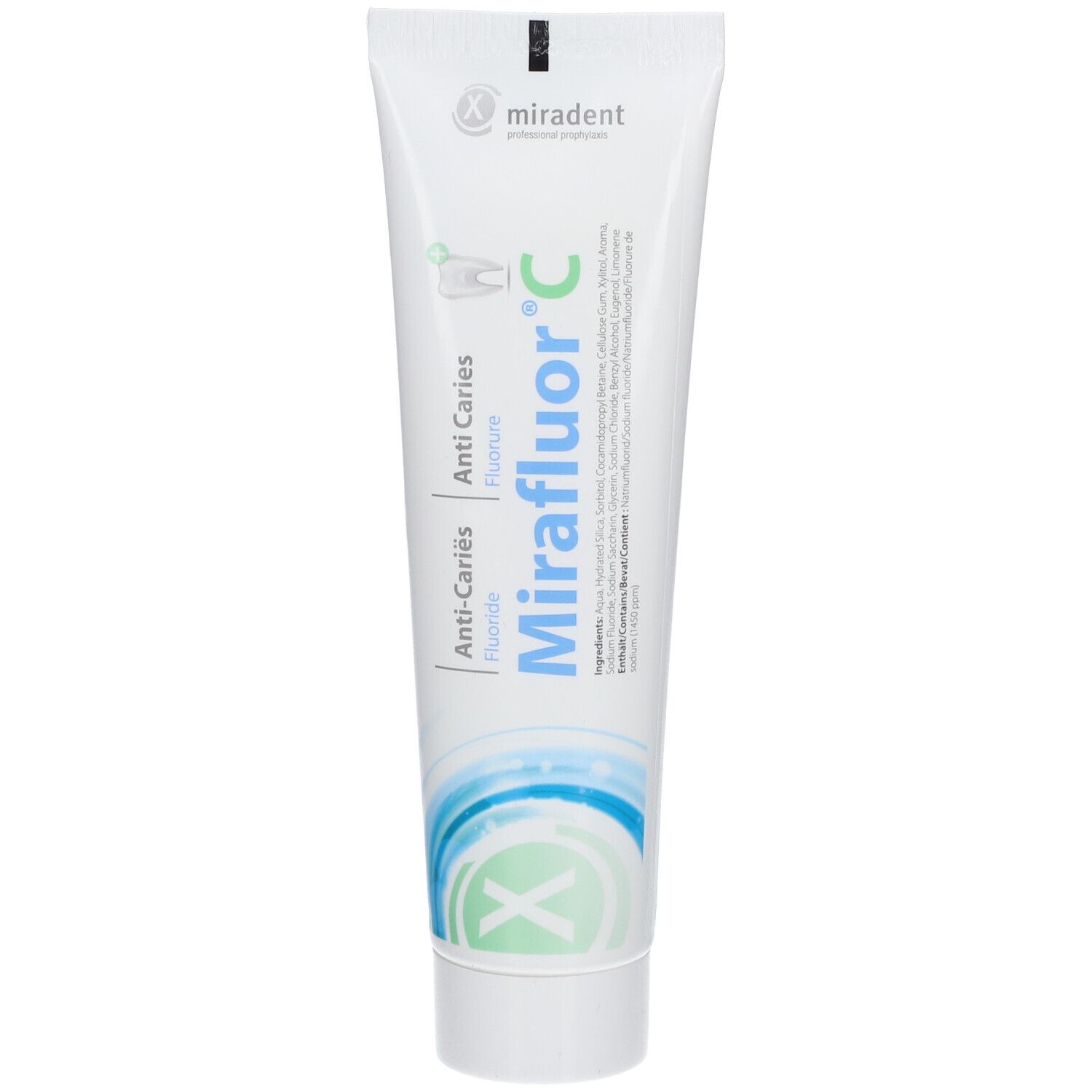 Tandpasta tube Miradent Mirafluor C, wit-blauw. Tekst: Anti-cariës, Fluoride. Logo en tekst.
