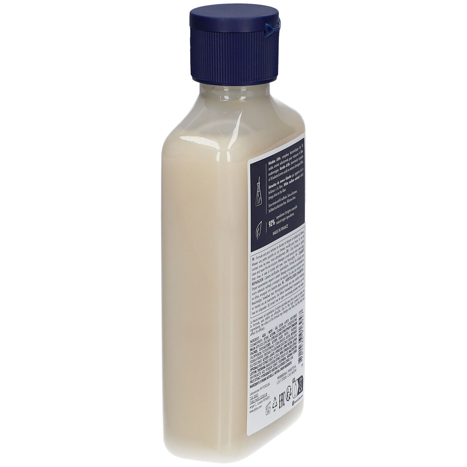 Achterkant fles PHYTO Repairing Shampoo. Tekstinformatie. 92% natuurlijke ingrediënten. Gemaakt in Frankrijk.