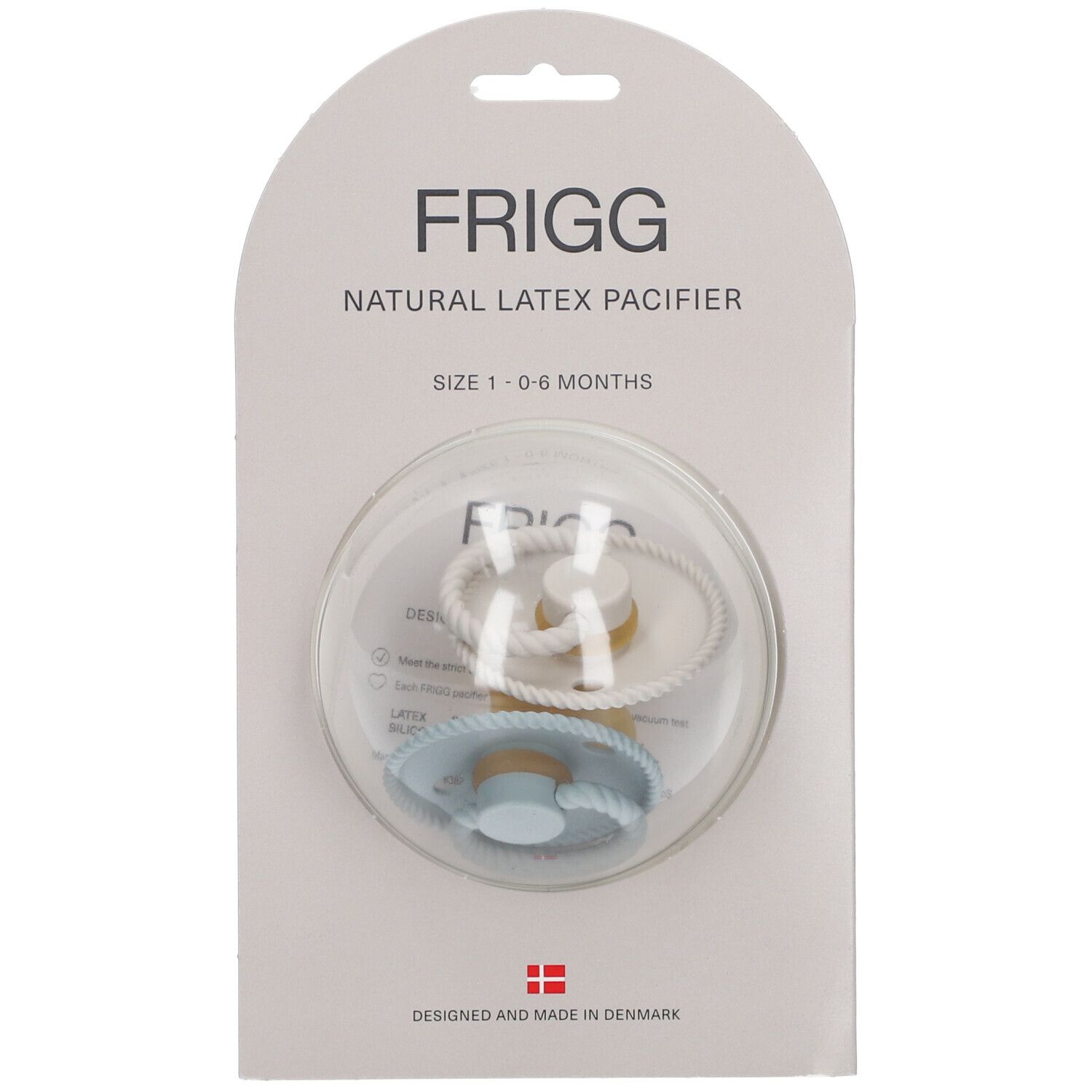 Deux sucettes FRIGG, taille 1, 0-6 mois, en emballage. Sucettes bleu clair et crème. En latex naturel.