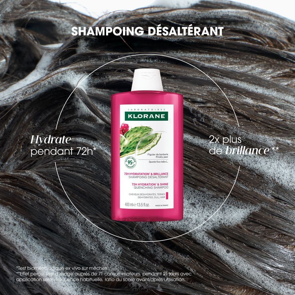 Flacon de shampooing Klorane sur cheveux. Produit et texte.