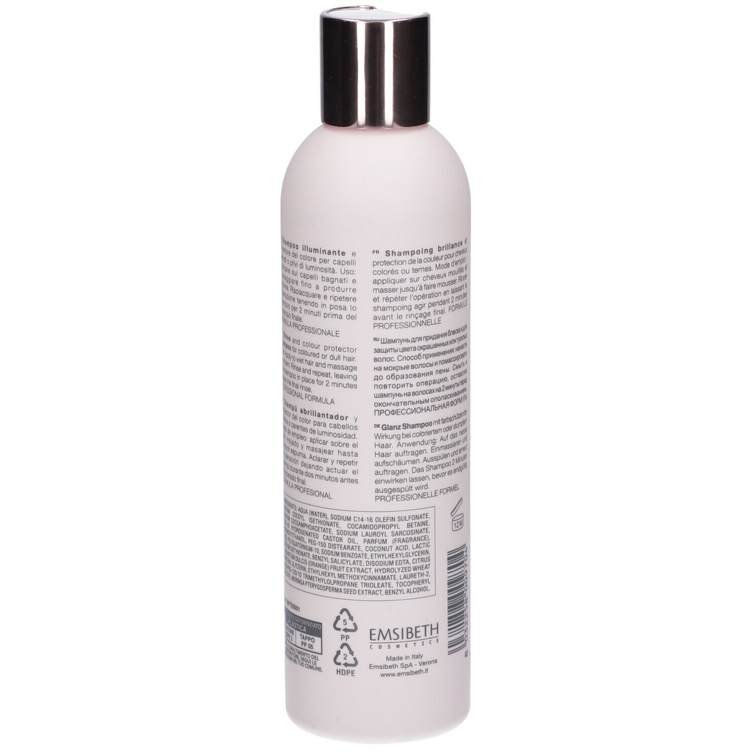 Rückseite der rosa Shampoo-Flasche. Text in mehreren Sprachen. Recycling-Symbole und Herstellerinformationen.