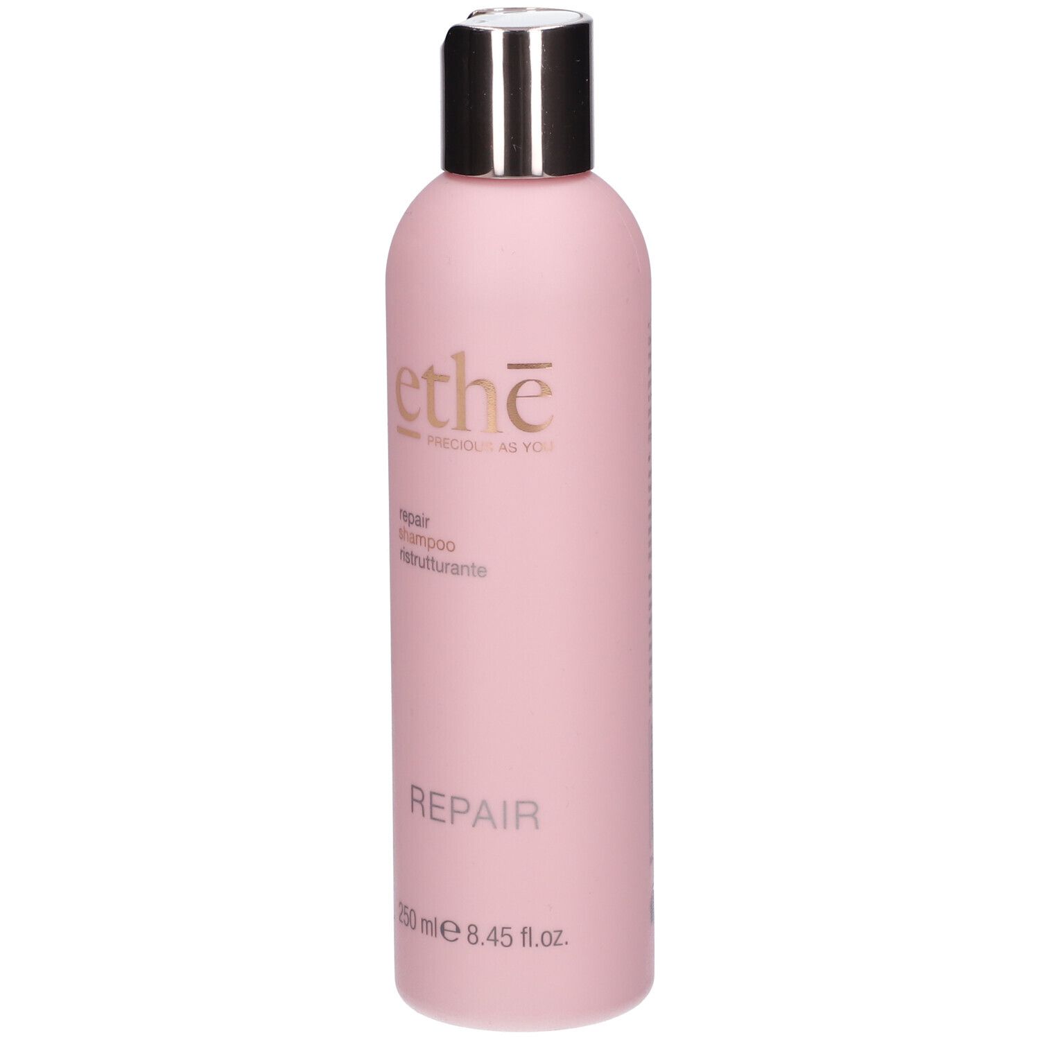 Rosa Flasche mit silbernem Deckel. Aufschrift: ethè, Repair Shampoo, 250 ml.