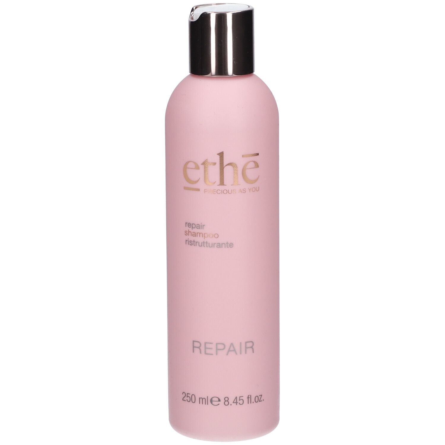Rosa Flasche mit silbernem Deckel. Aufschrift: ethè, Repair Shampoo, 250 ml.