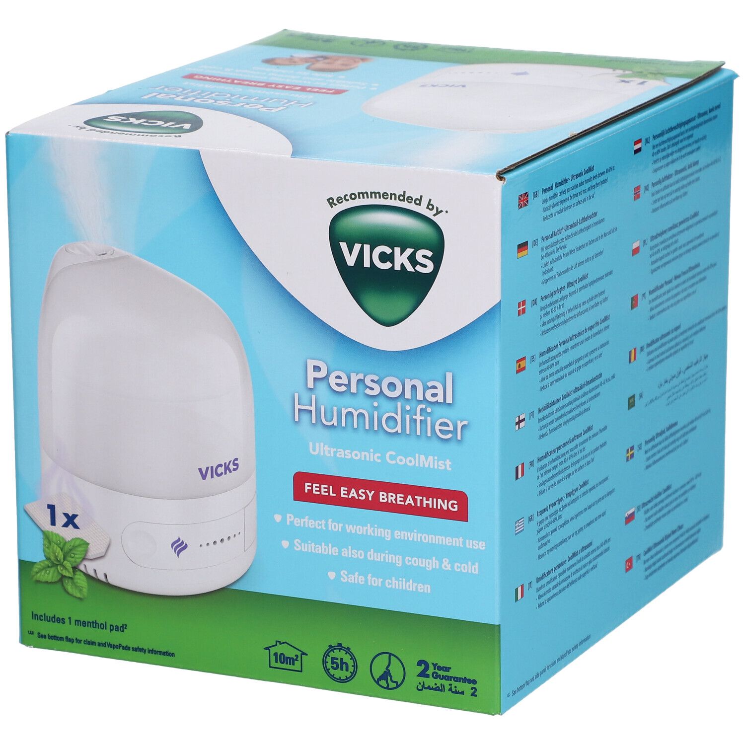 Boîte Vicks Personal Humidifier. Appareil blanc avec logo Vicks. Contient 1 tampon de menthol. Emballage bleu avec informations.