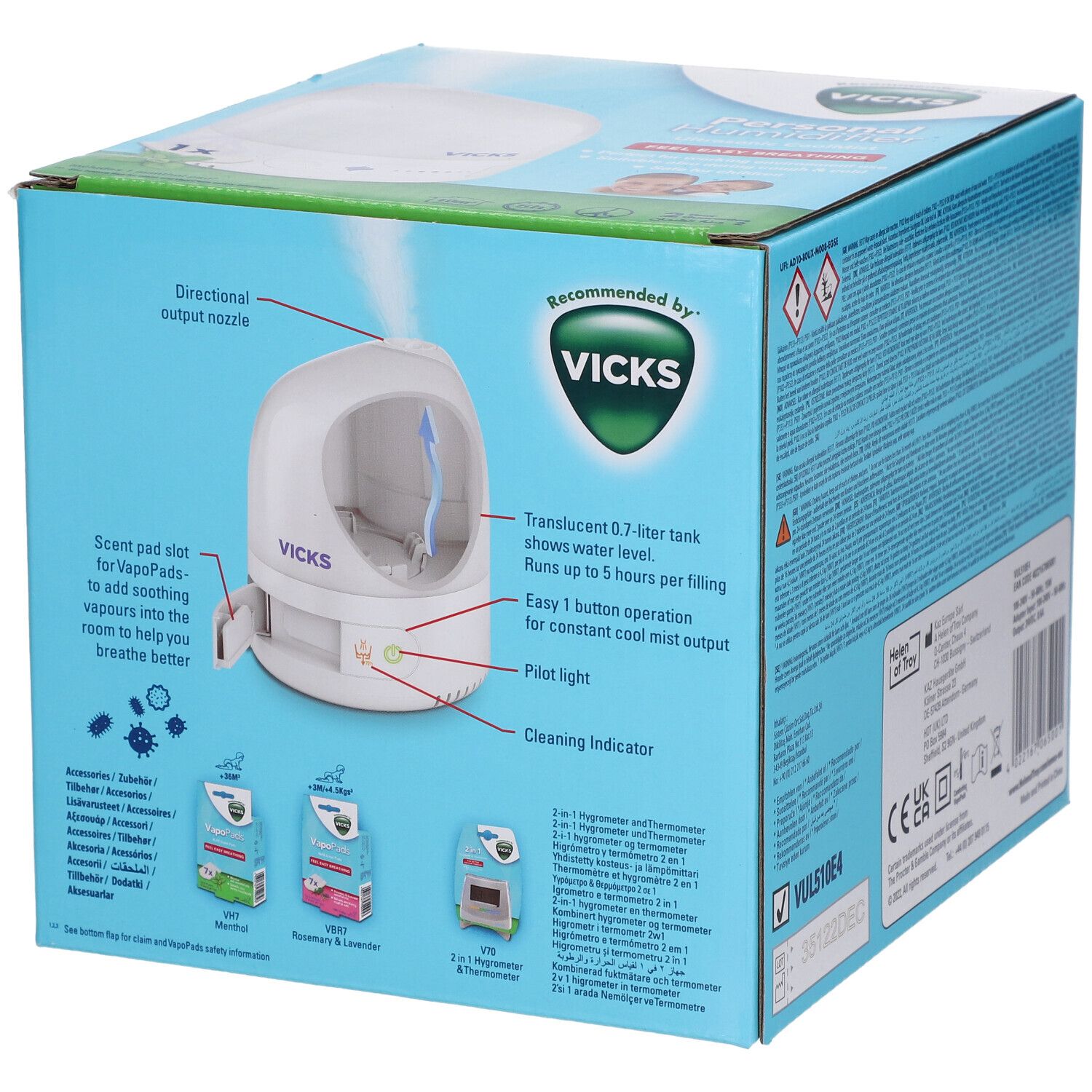 Boîte Vicks Personal Humidifier. Appareil avec couvercle ouvert. Montre un réservoir transparent, des commandes et l'emplacement VapoPads.