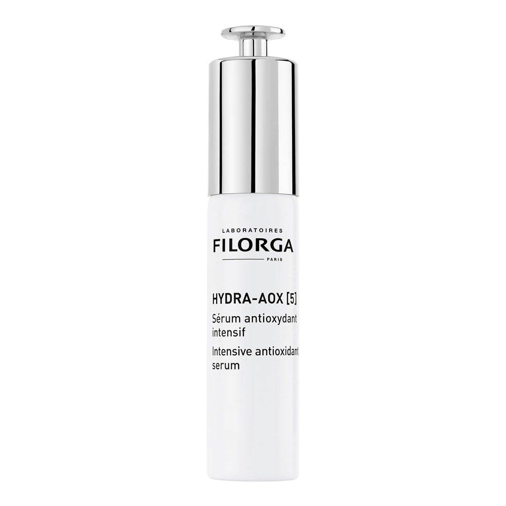 Weißes Serum-Fläschchen mit silbernem Deckel. FILORGA-Logo und Produktbezeichnung. Tropfer.